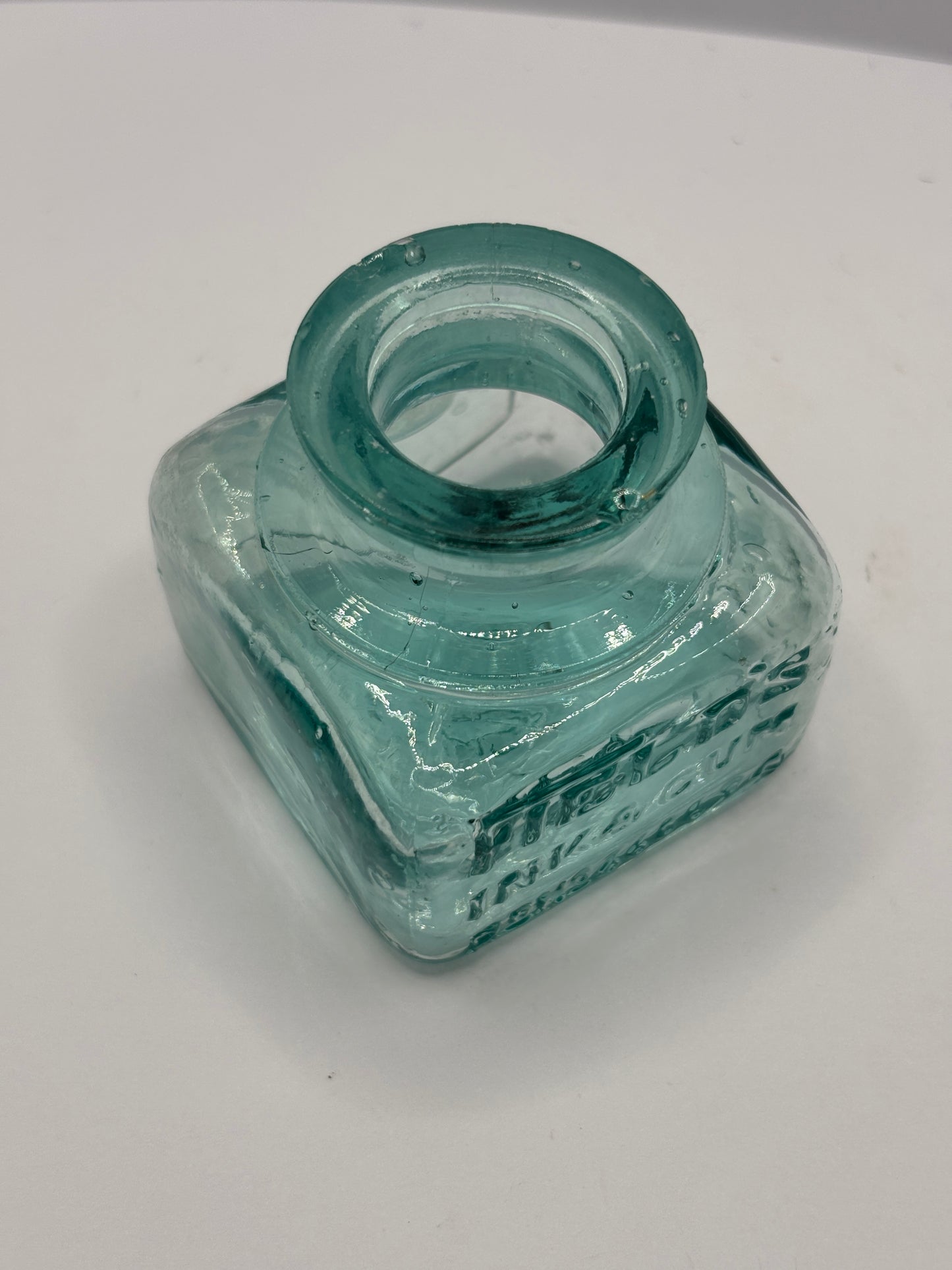 Old aqua glass ink bottle, inkwell. fields ink & gum