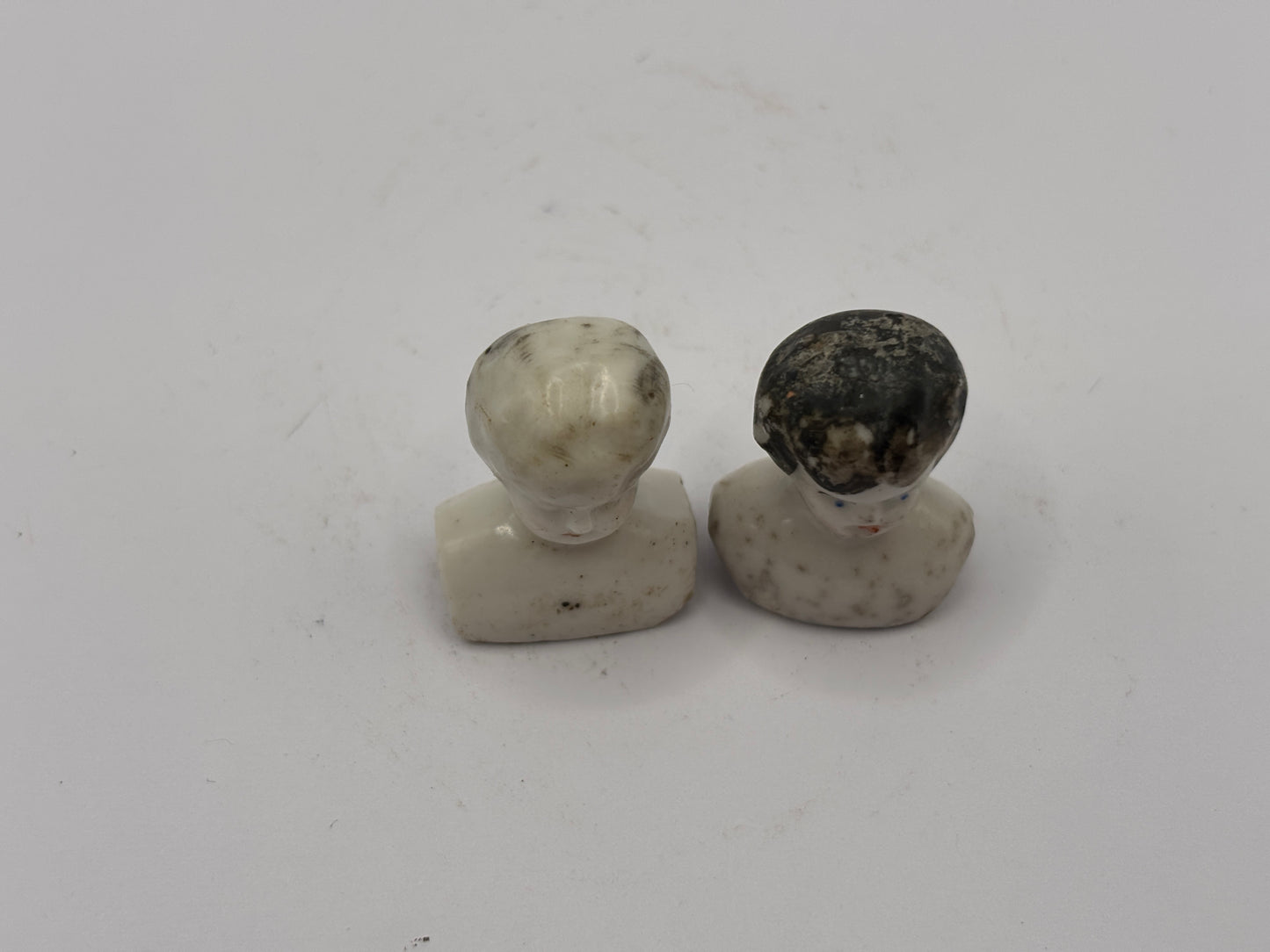 2 old miniature dolls heads