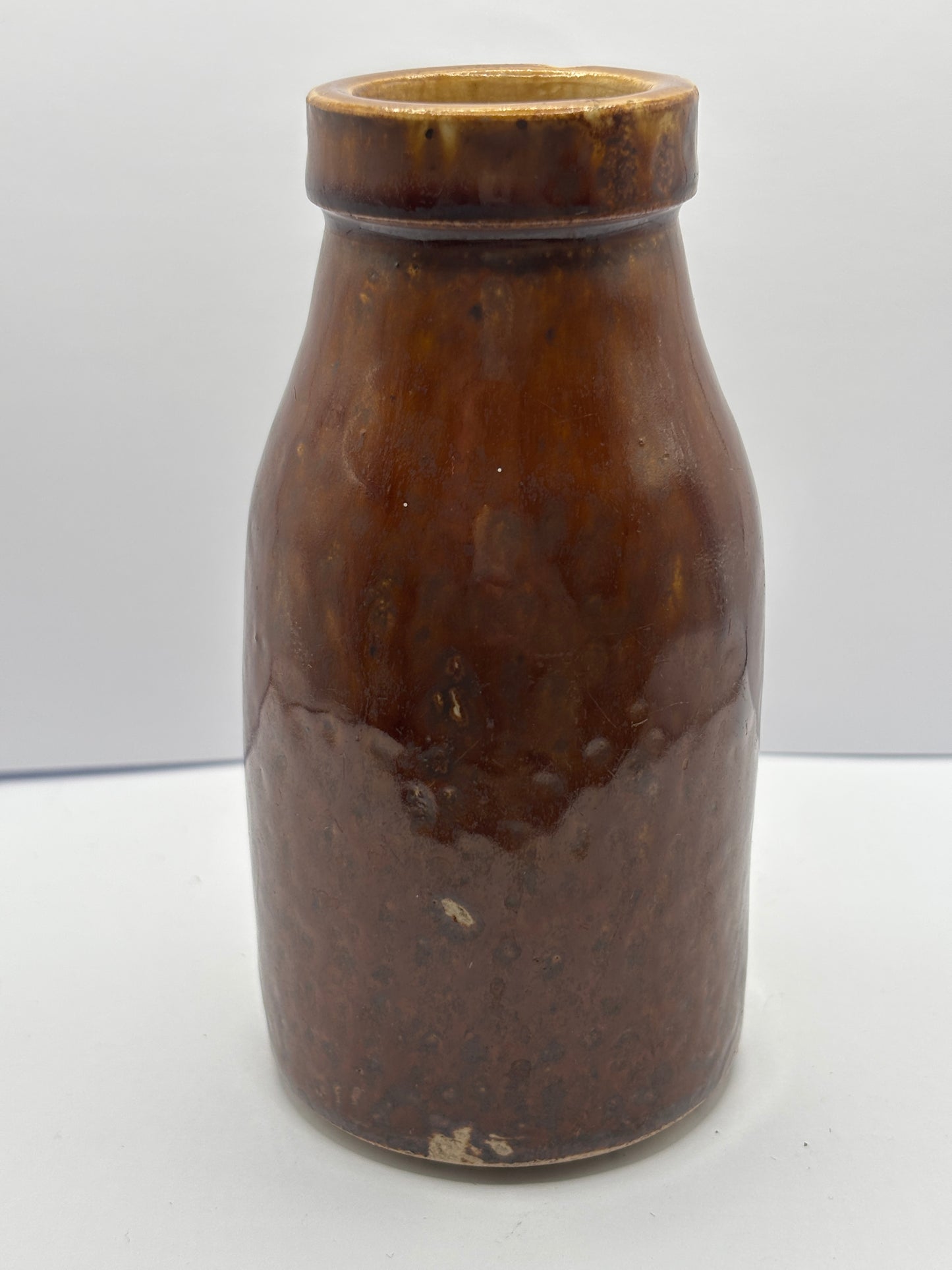 Old brown stoneware jar