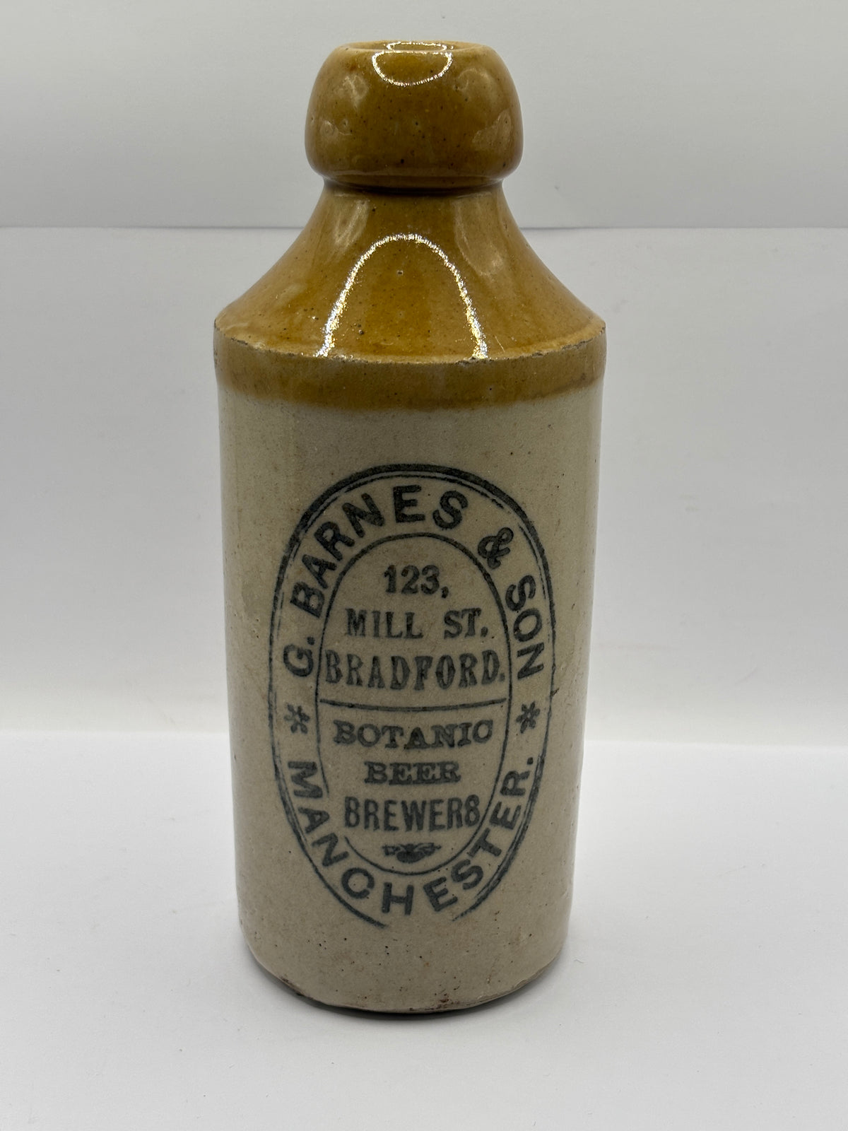 Old stoneware ginger beer bottle, Barnes & Son Manchester