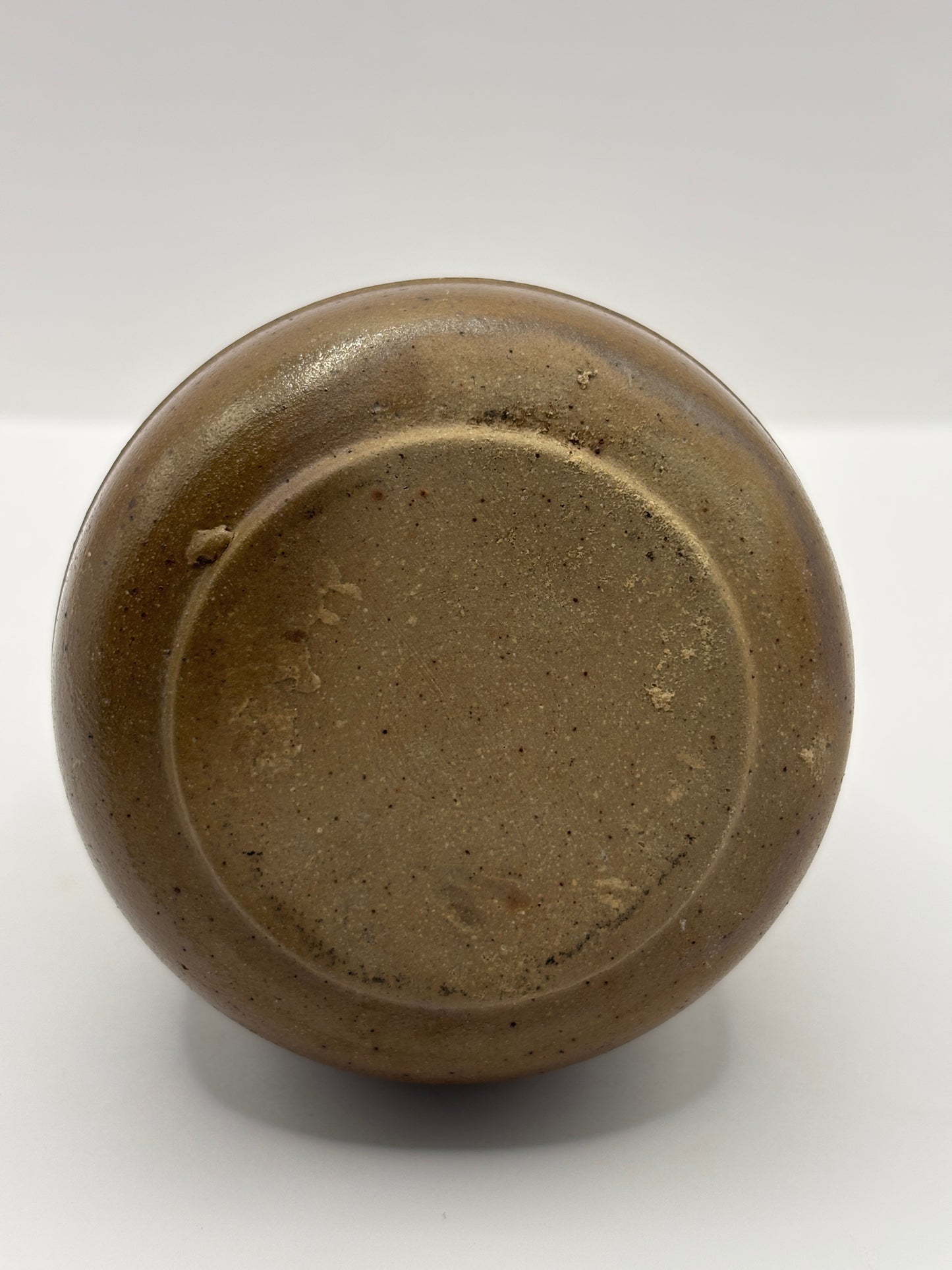Old brown stoneware Benoist jar