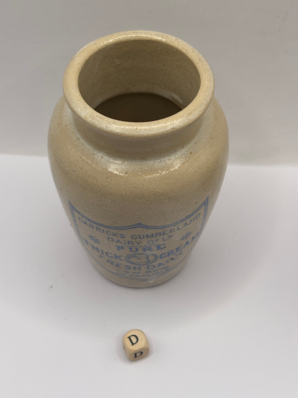 Old advertising cream pot, Carricks Cumberland dairy (D)
