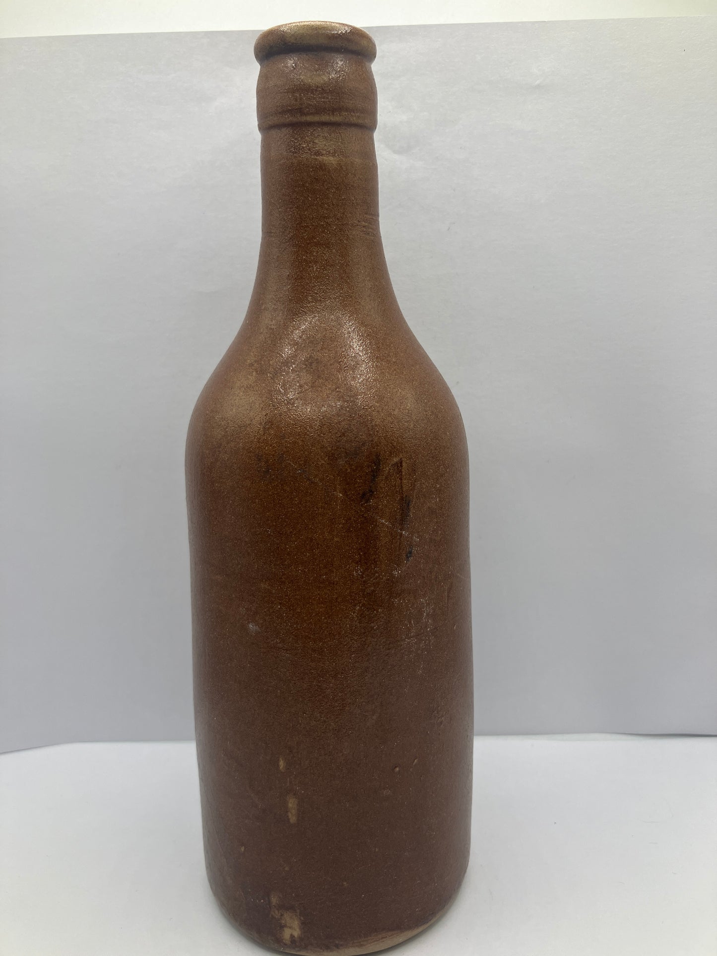 Brown stoneware ginger beer bottle, Harris & Co