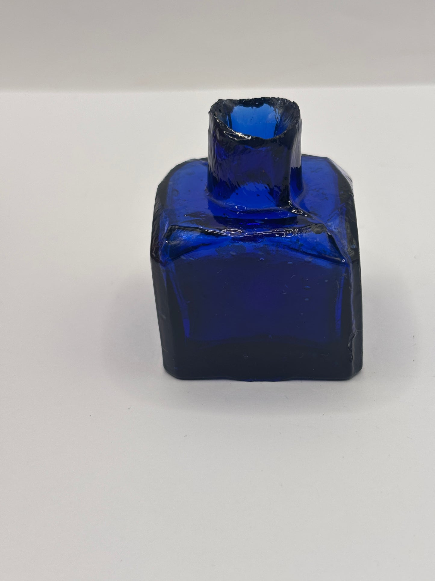 Old cobalt blue glass inkwell, ink bottle