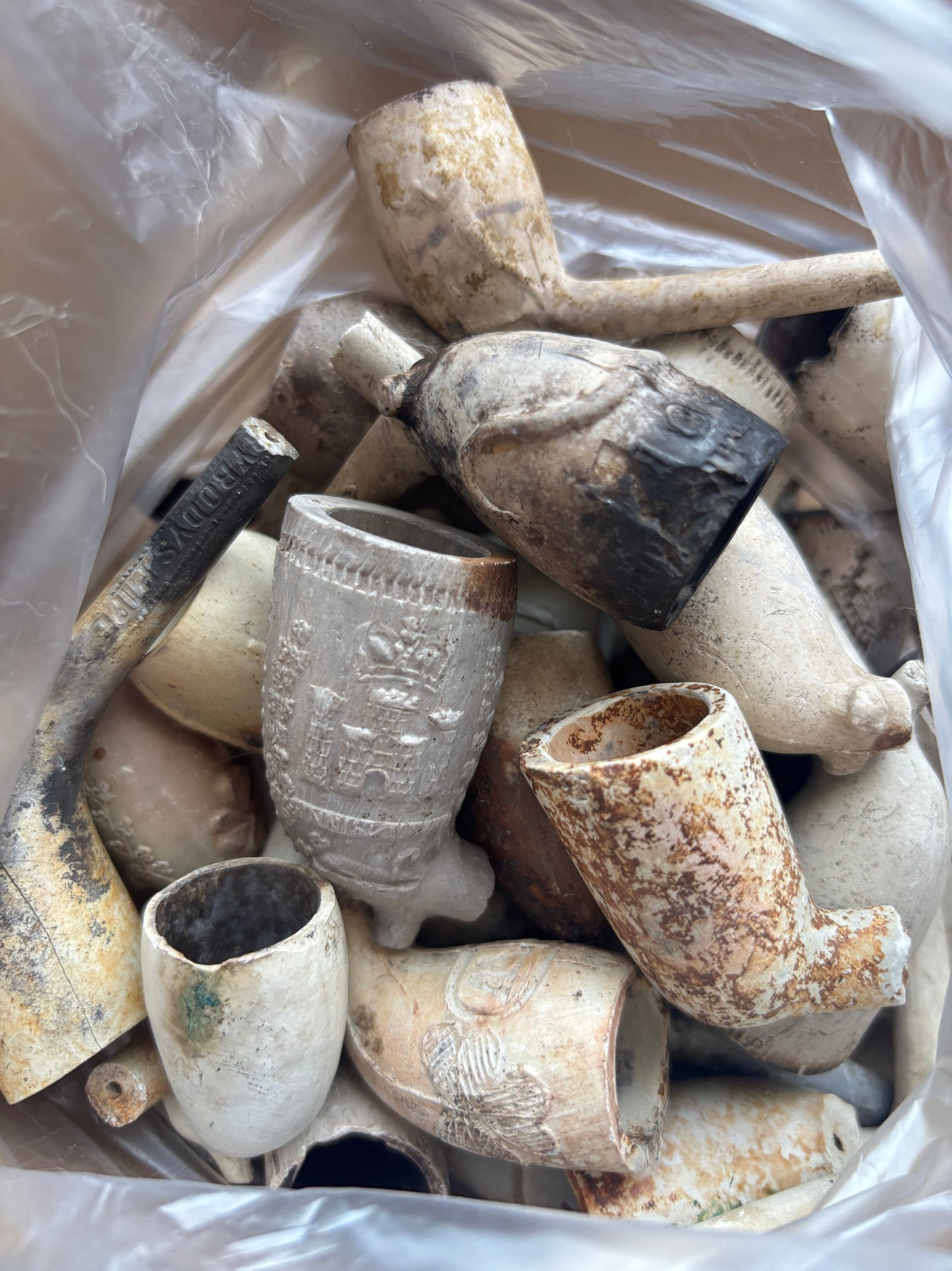 50 old clay pipe bowls