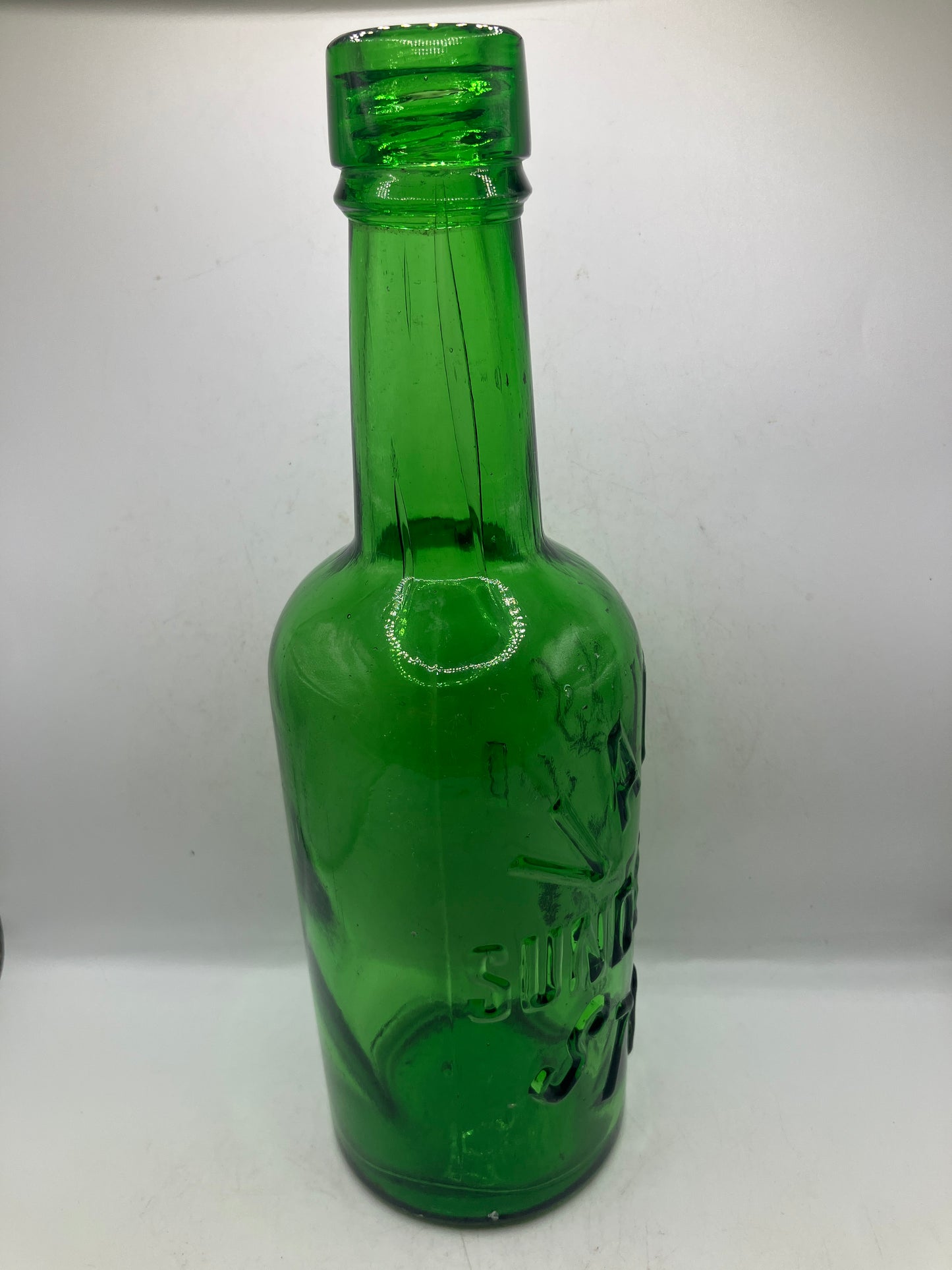 Vaux’s green glass beer bottle