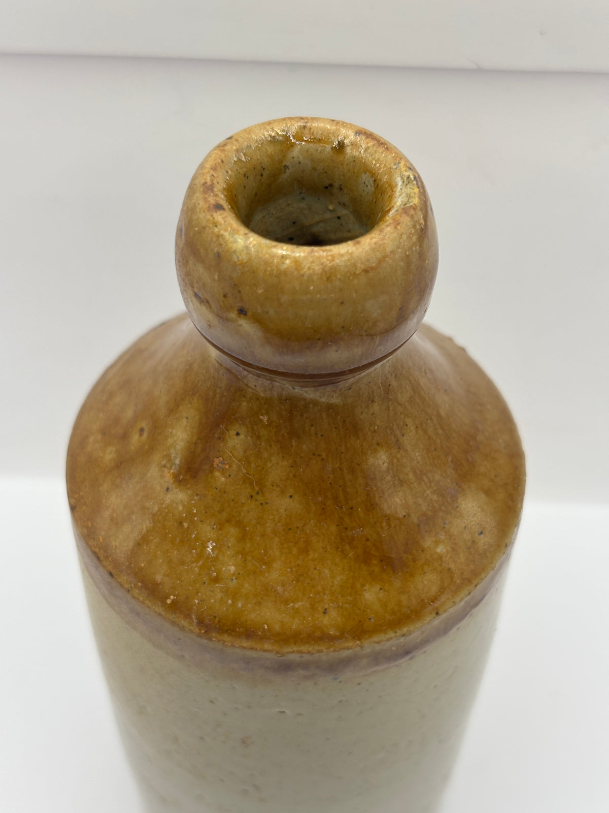 Old impressed stoneware ginger beer bottle, Manchester. J.Finch