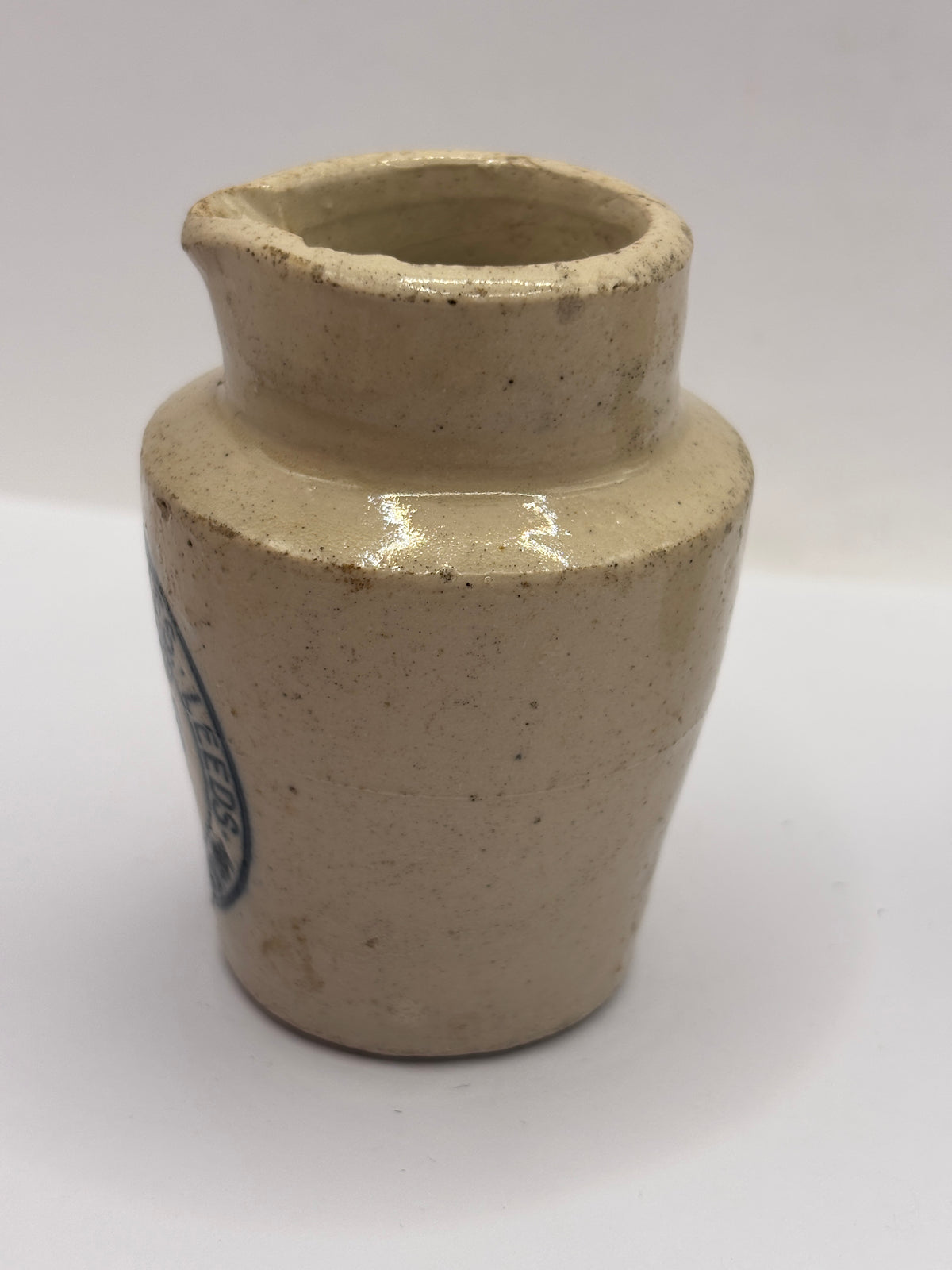Old advertising cream pot, Provinical dairies Leeds. Chipped