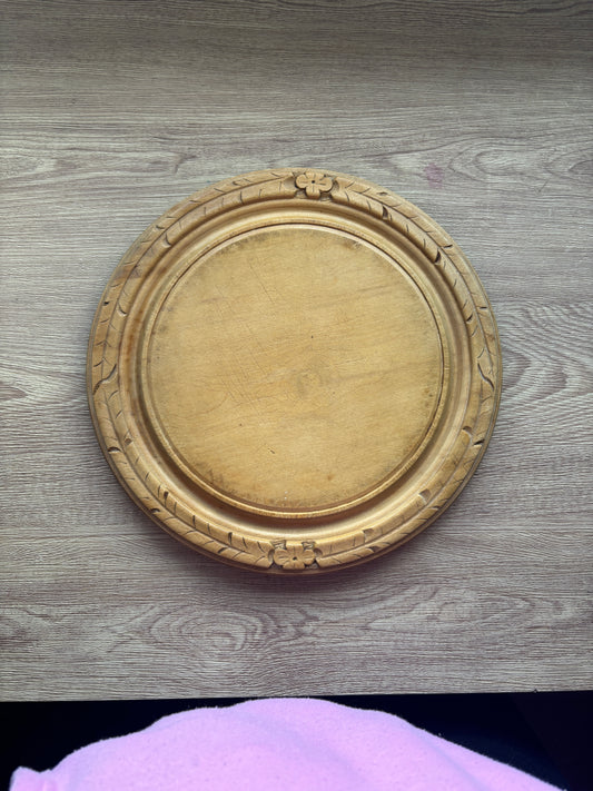 Old wooden carved bread board