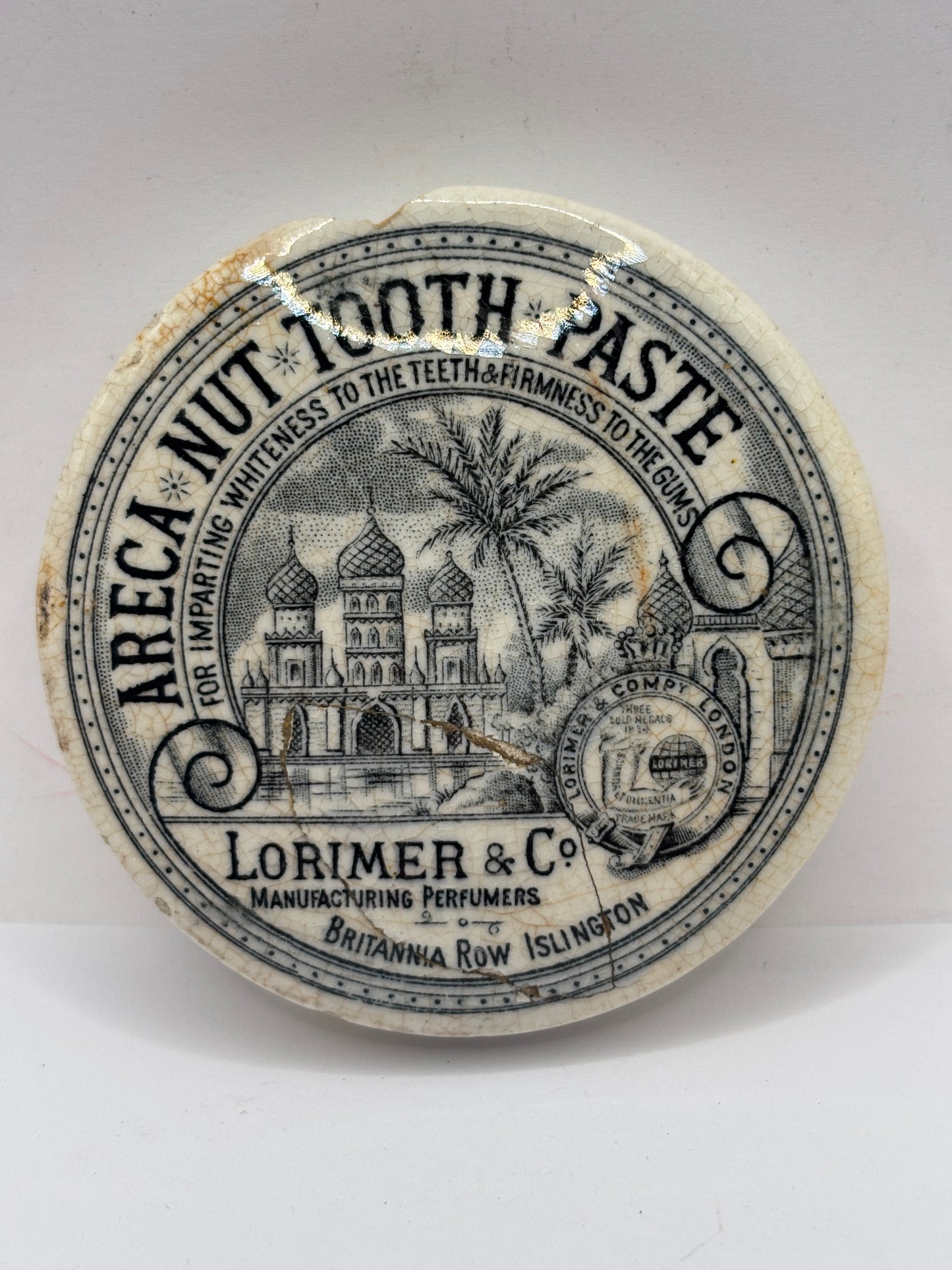 Old advertising lid, Lorimer & Co Areca nut tooth paste. Damaged