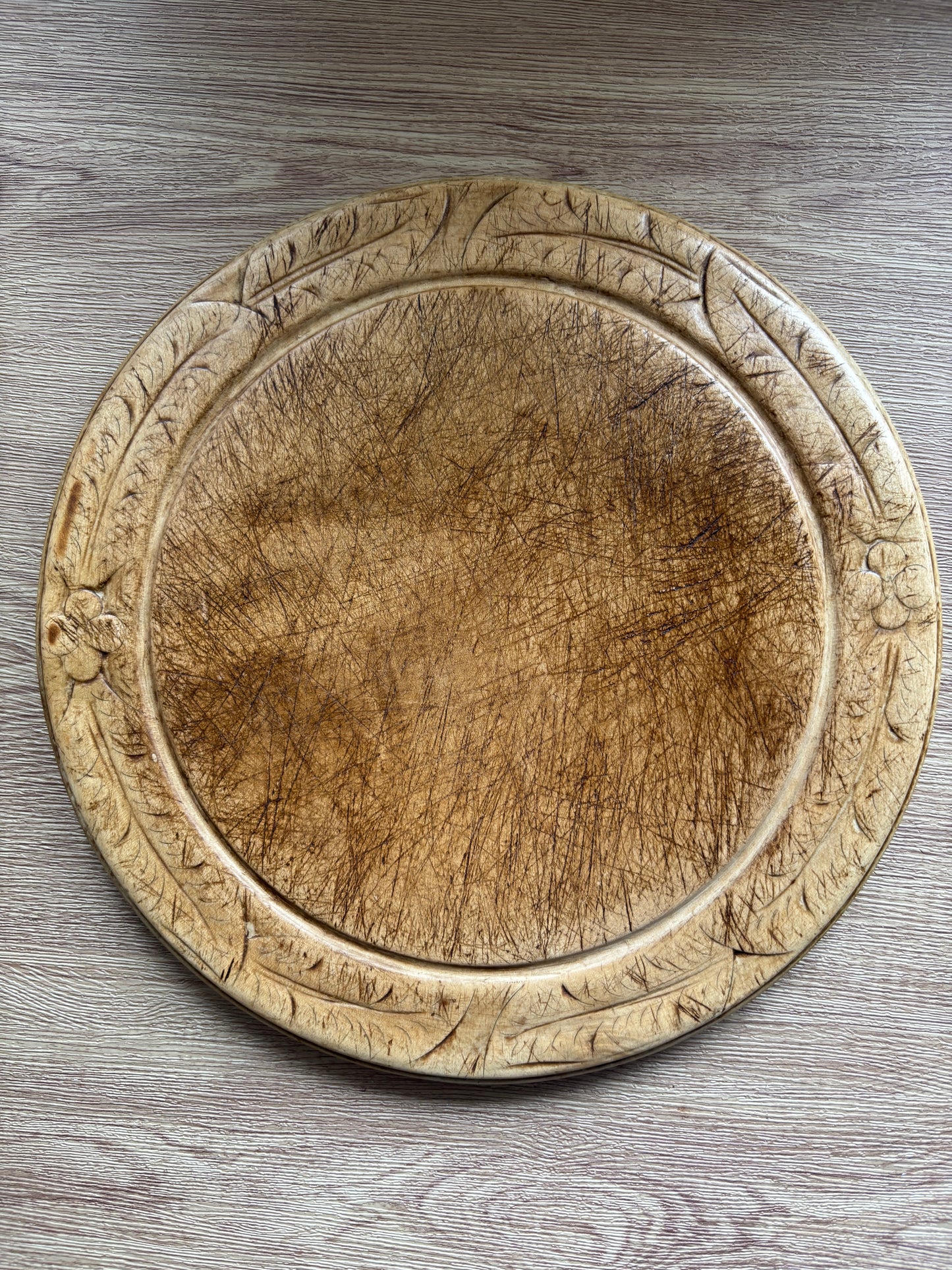 Old wooden carved bread board