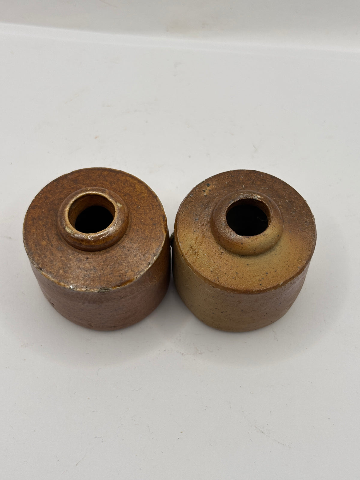 2 Old stoneware ink bottles, inkwells, pork pies