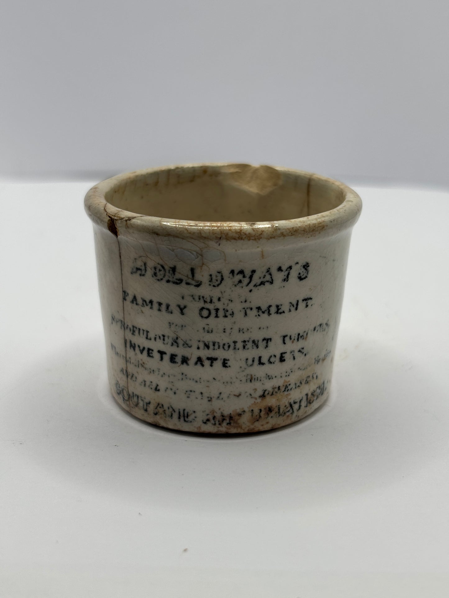 Old early Holloways advertising ointment pot