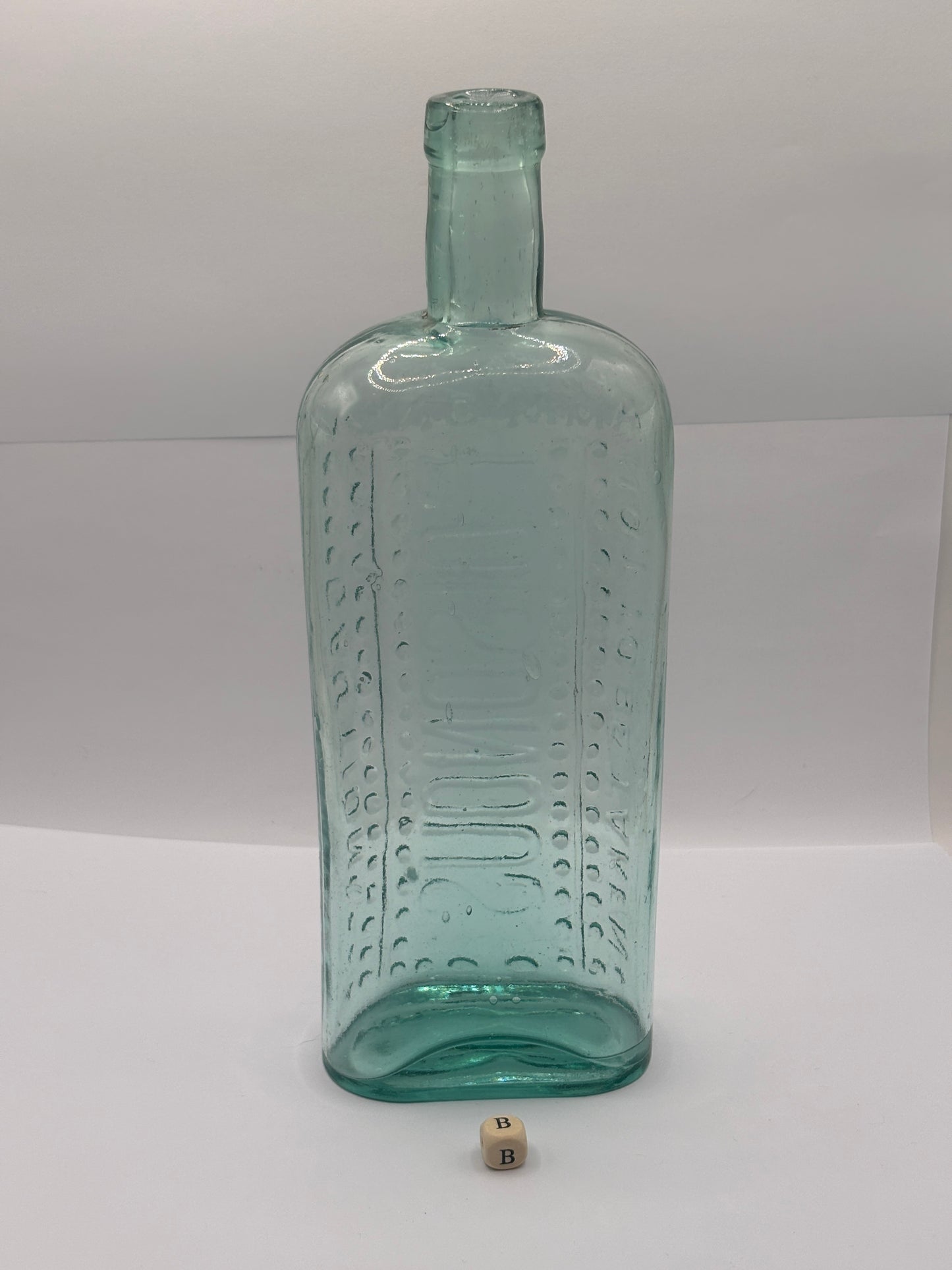Old large aqua glass poison bottle, Poisonous (B) ammonia