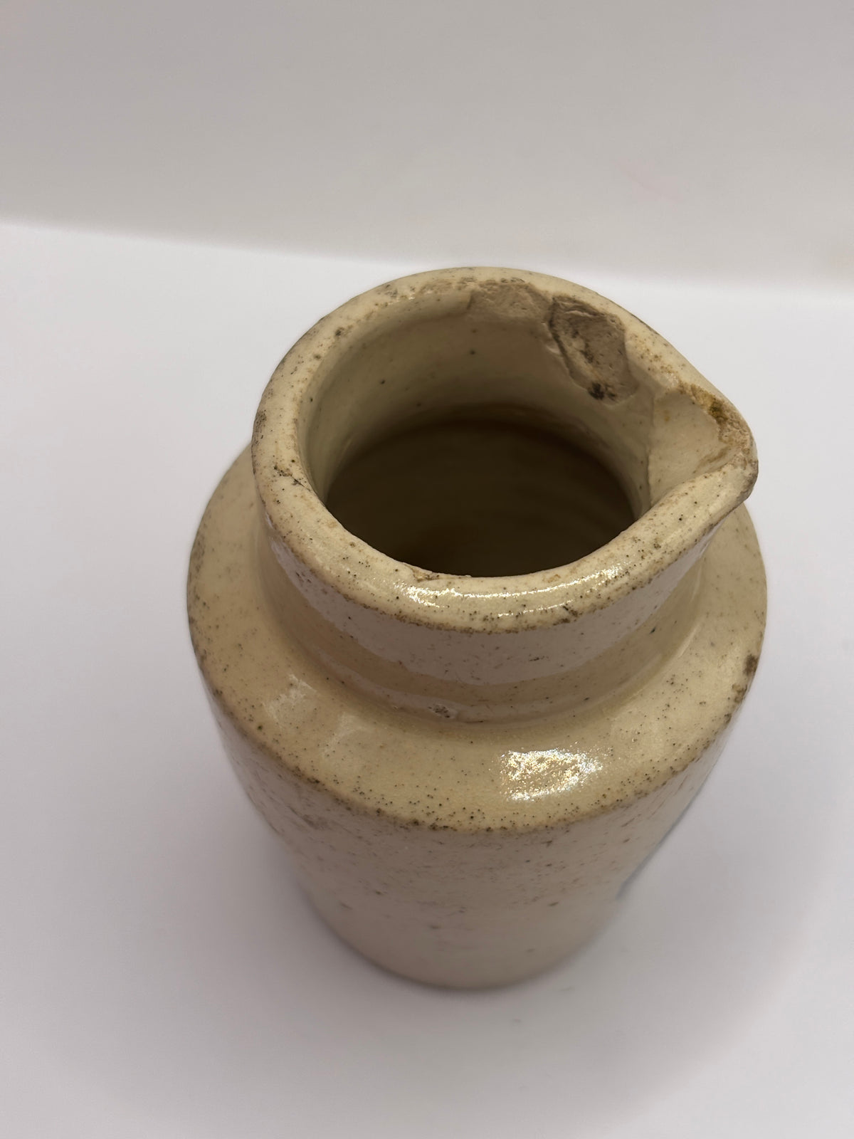 Old advertising cream pot, Provinical dairies Leeds. Chipped
