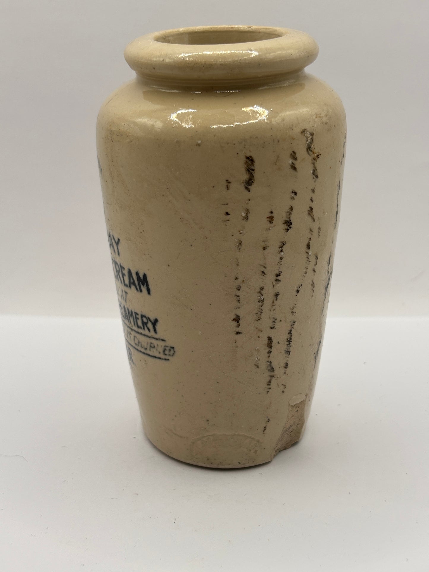 Old advertising cream pot, Galloway preserved cream. Damaged
