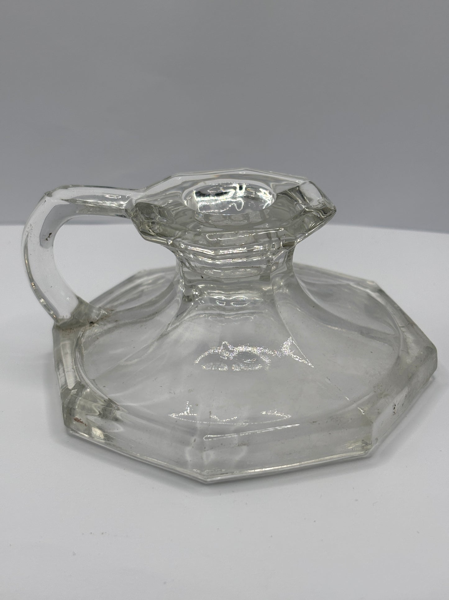 Old glass candlestick holder