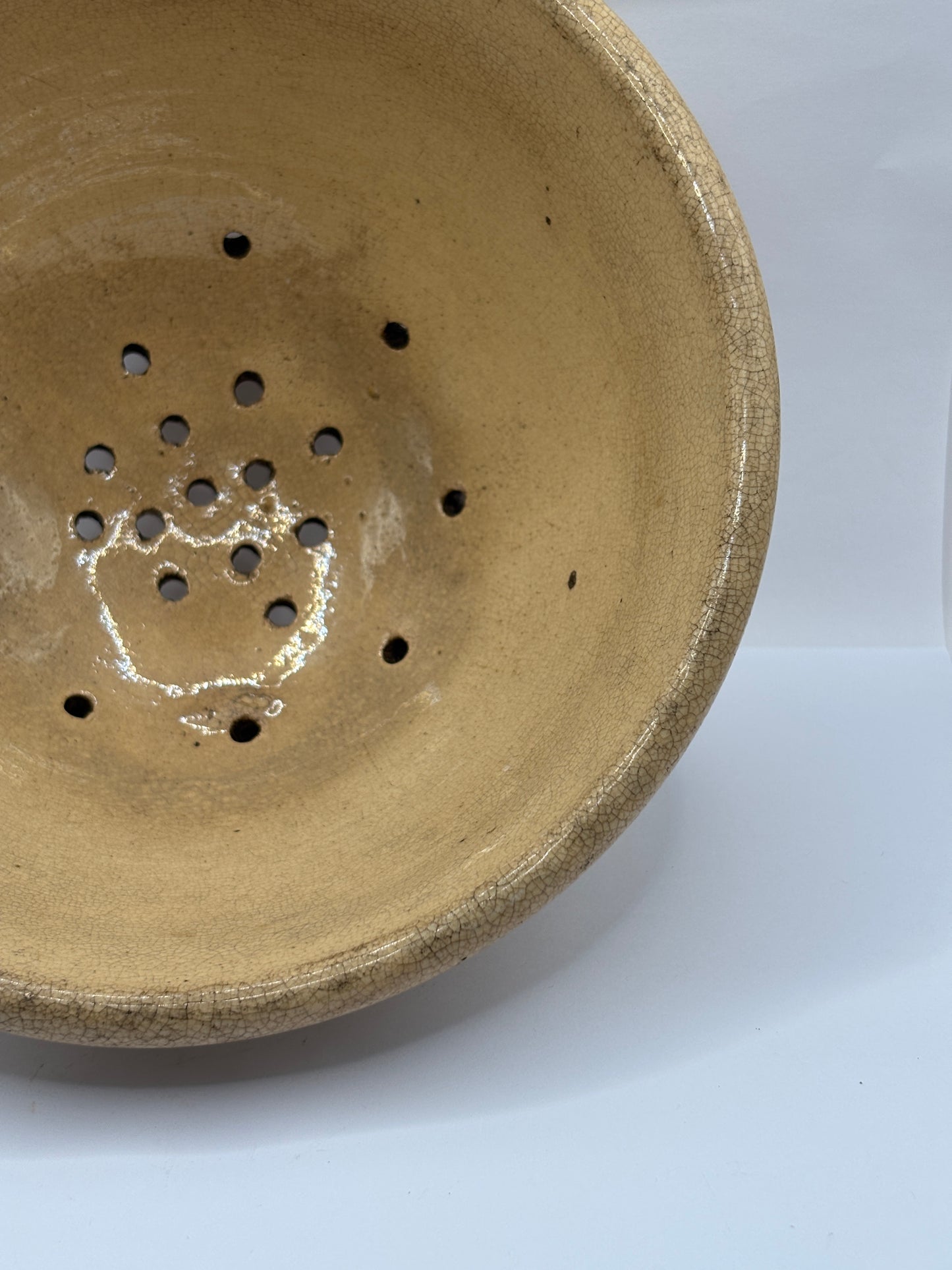 Old English stoneware strainer, crazed