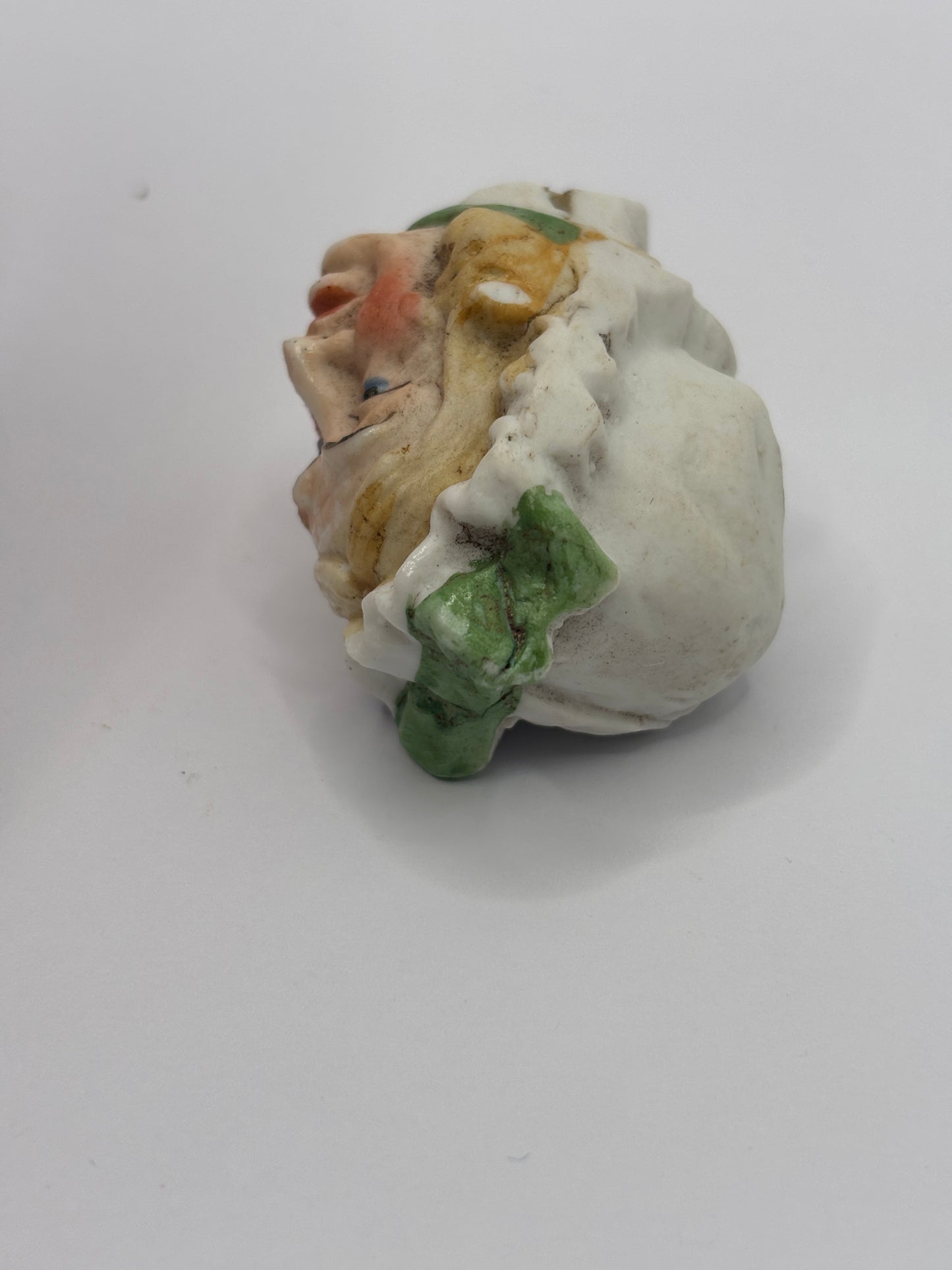 Old dolls head, damaged