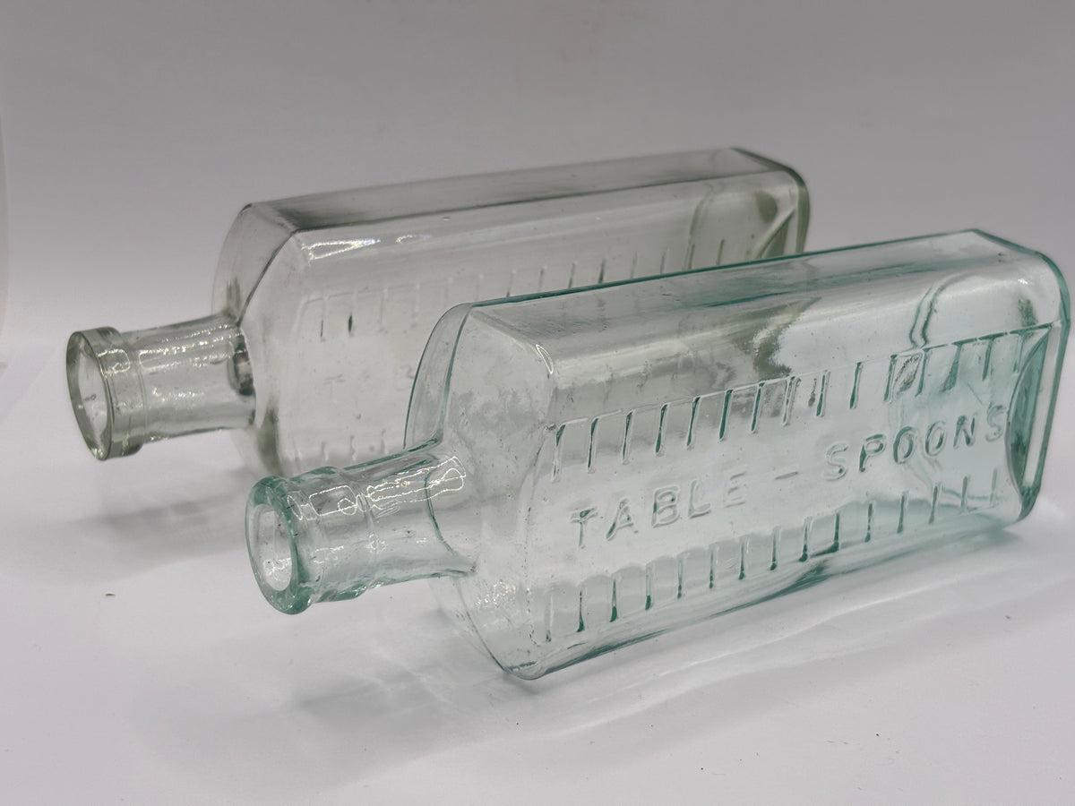 2 old aqua glass medicine bottles, table spoons