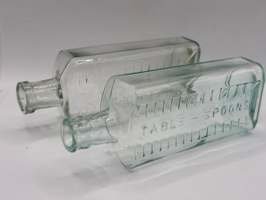 2 old aqua glass medicine bottles, table spoons