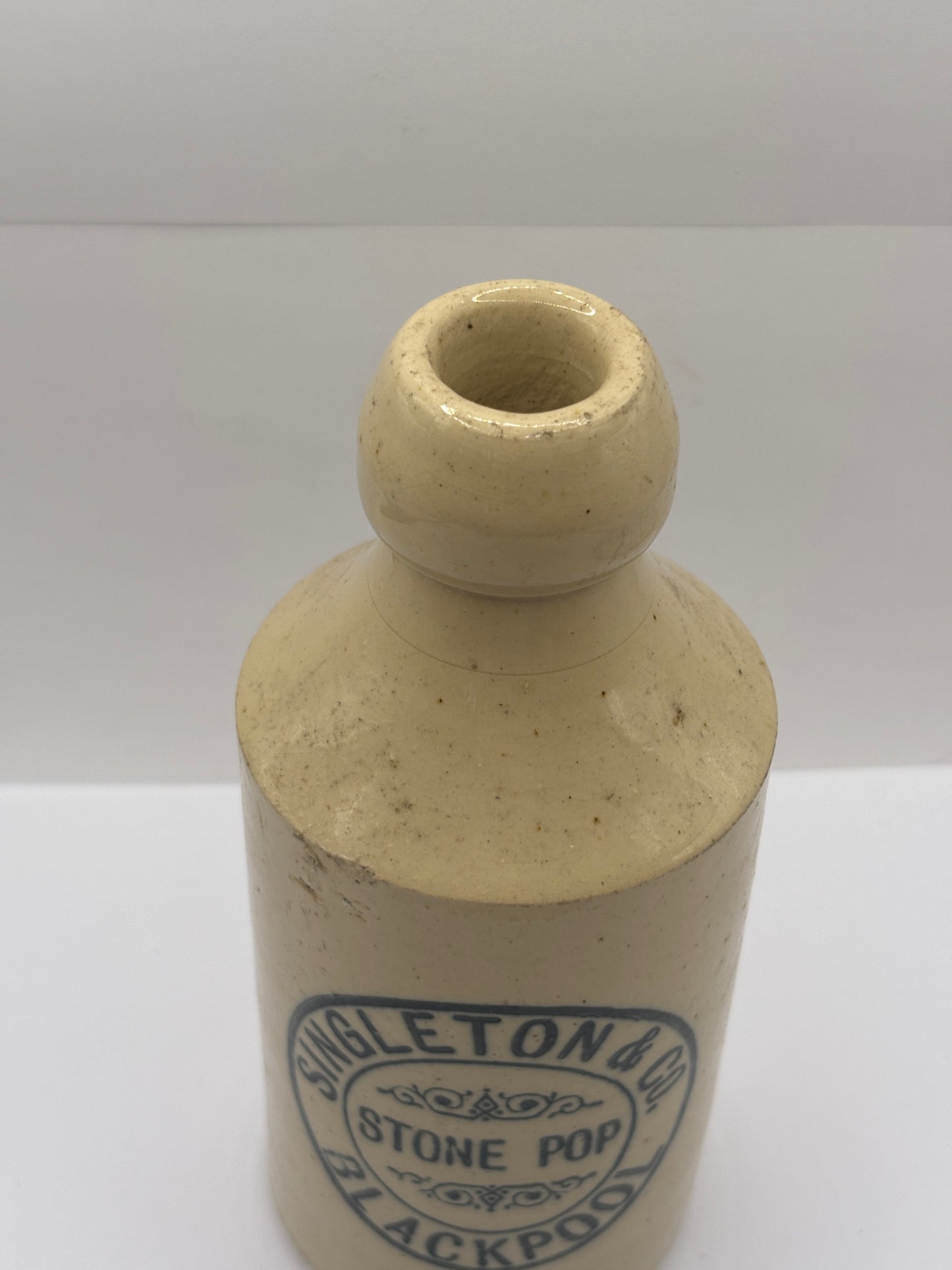 Old stoneware ginger beer bottle, Singleton & Co stone pop, Blackpool