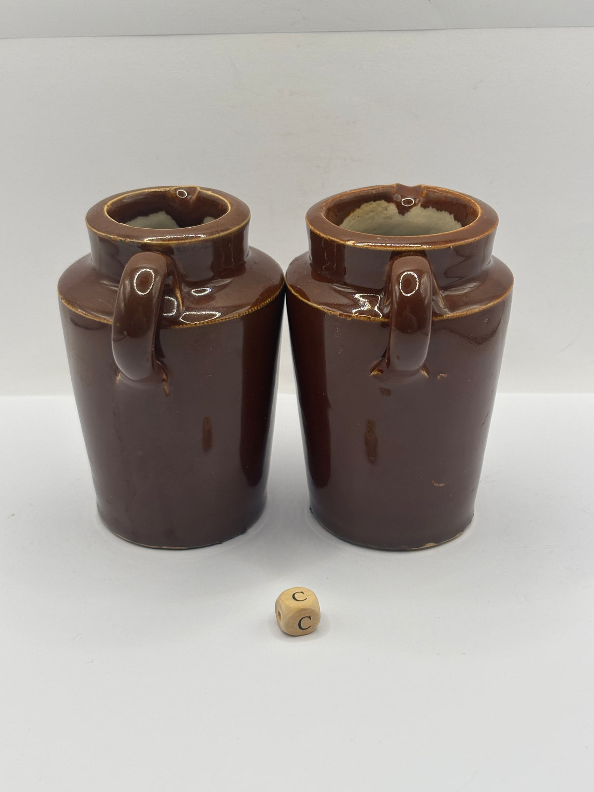 2 Old brown stoneware cream pots (C)