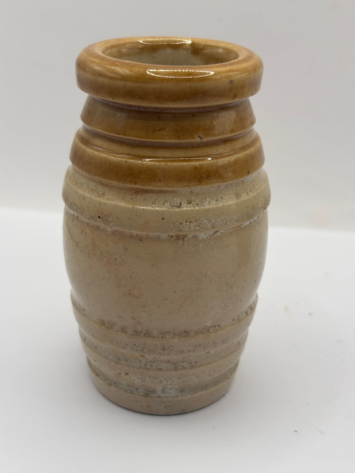 Old brown top stoneware senna jar