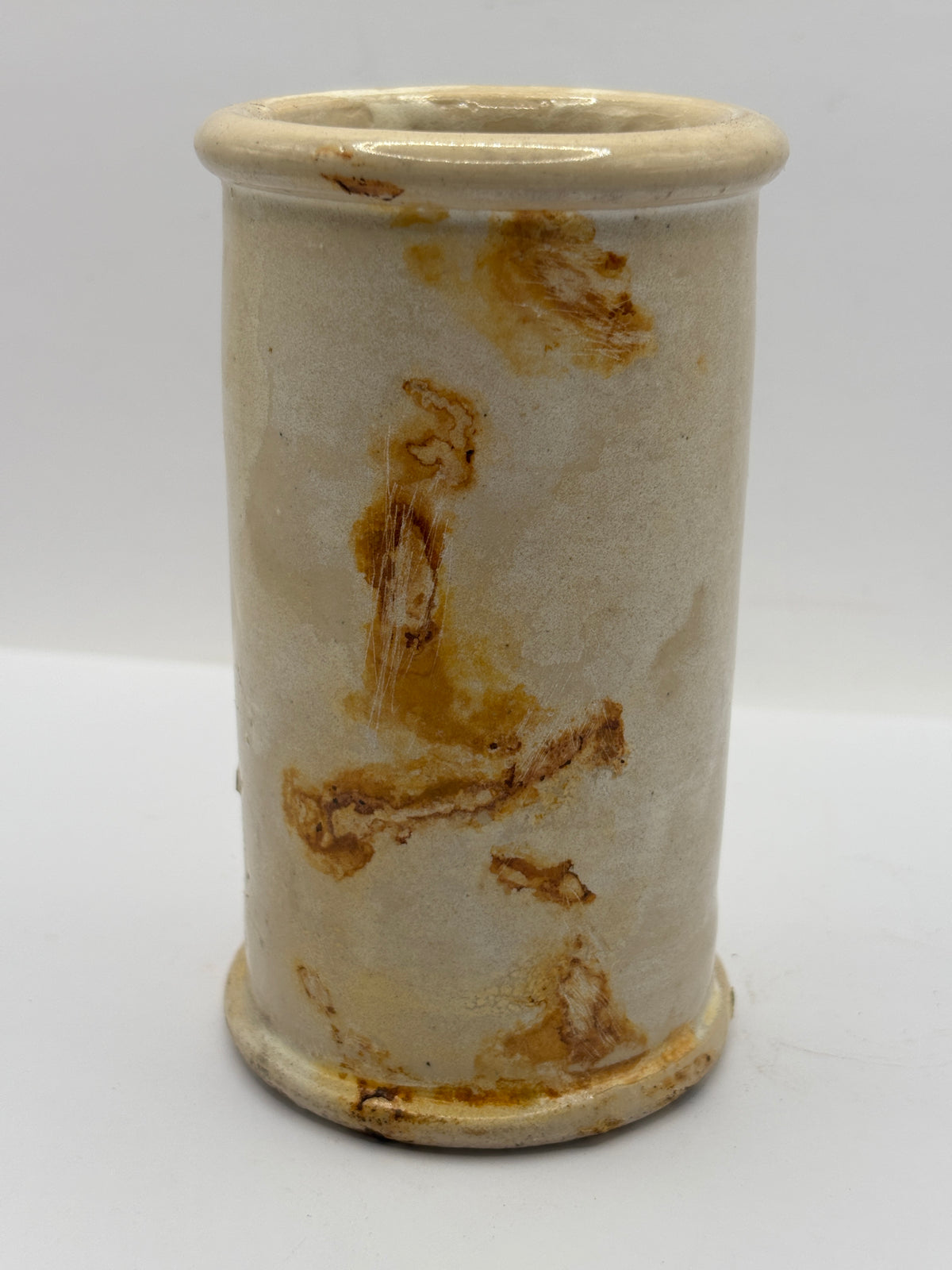 Old tall stained stoneware cream pot