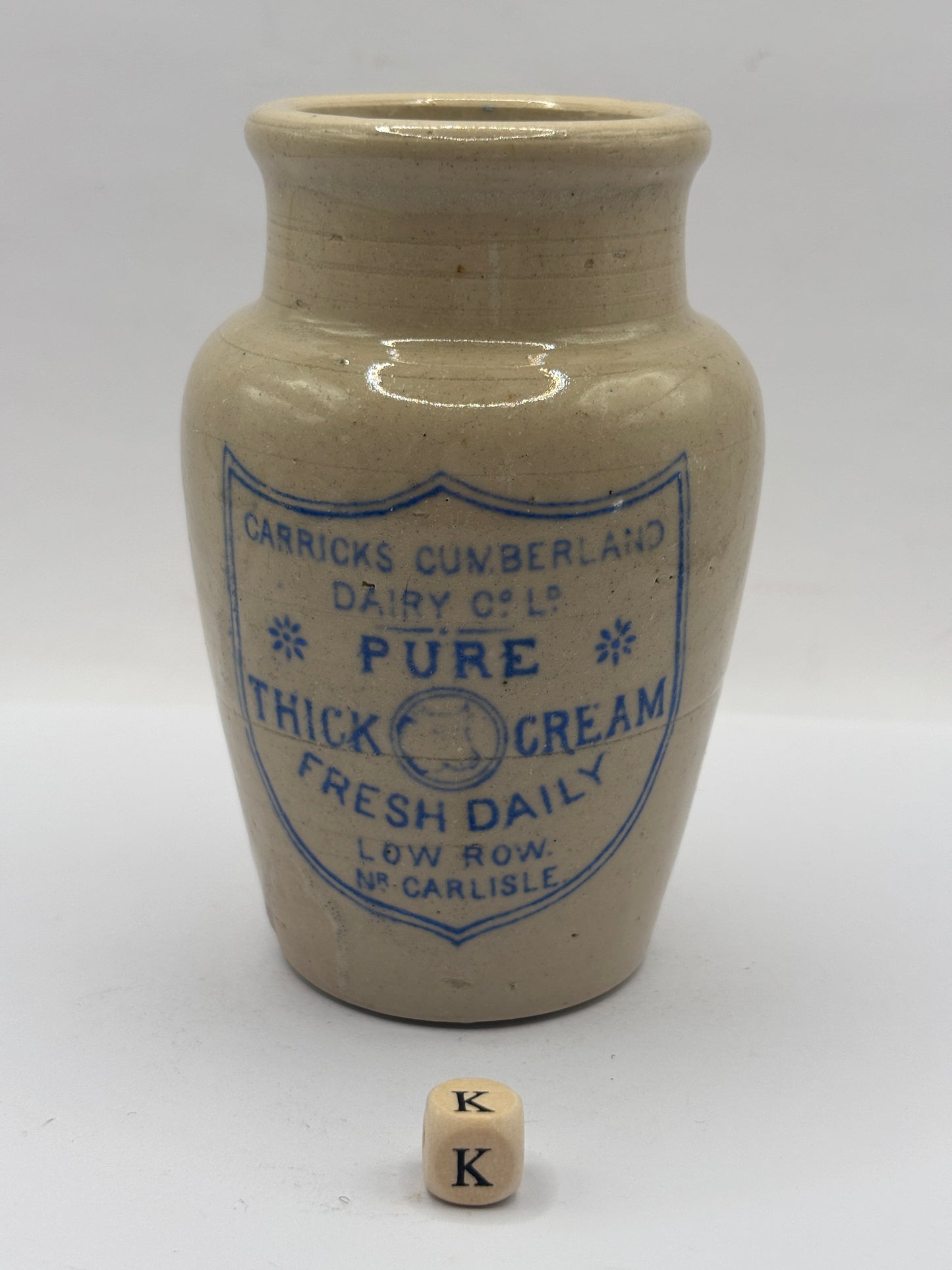 Old advertising cream pot, Carricks Cumberland dairy. Pure thick cream (k)