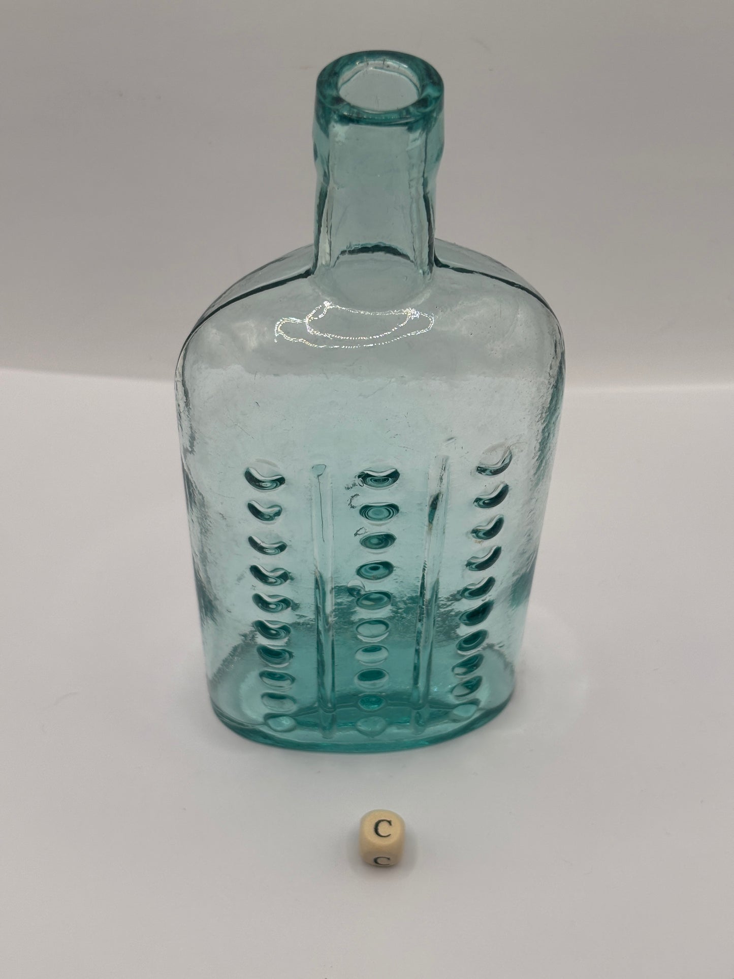 Old aqua glass poison bottle, (c)