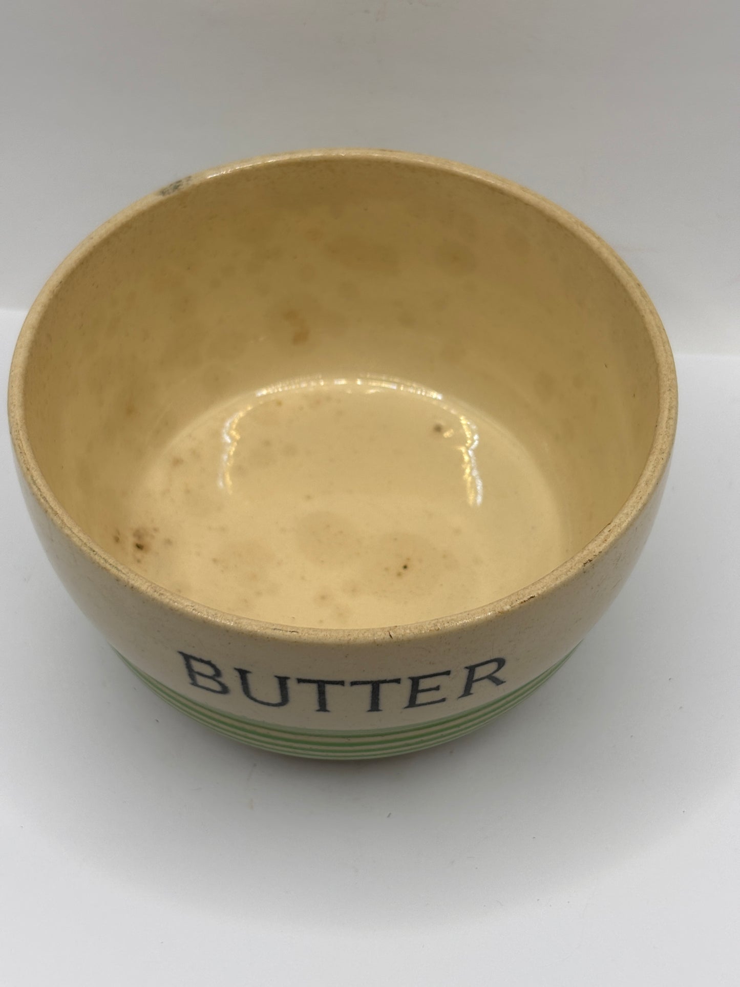 Old stoneware butter dish, no lid. Stained