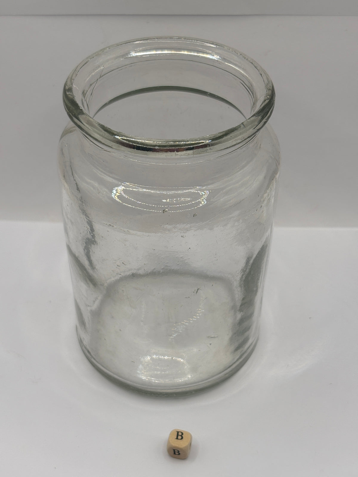 Old clear glass pickle jar (B)