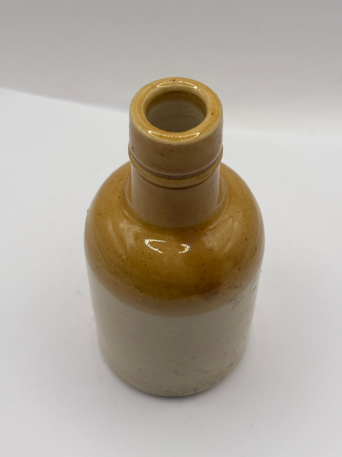 Old brown too stoneware bottle