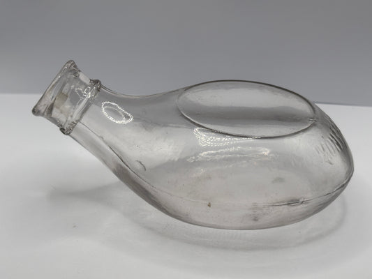 Old clear glass baby feeder. Montreal