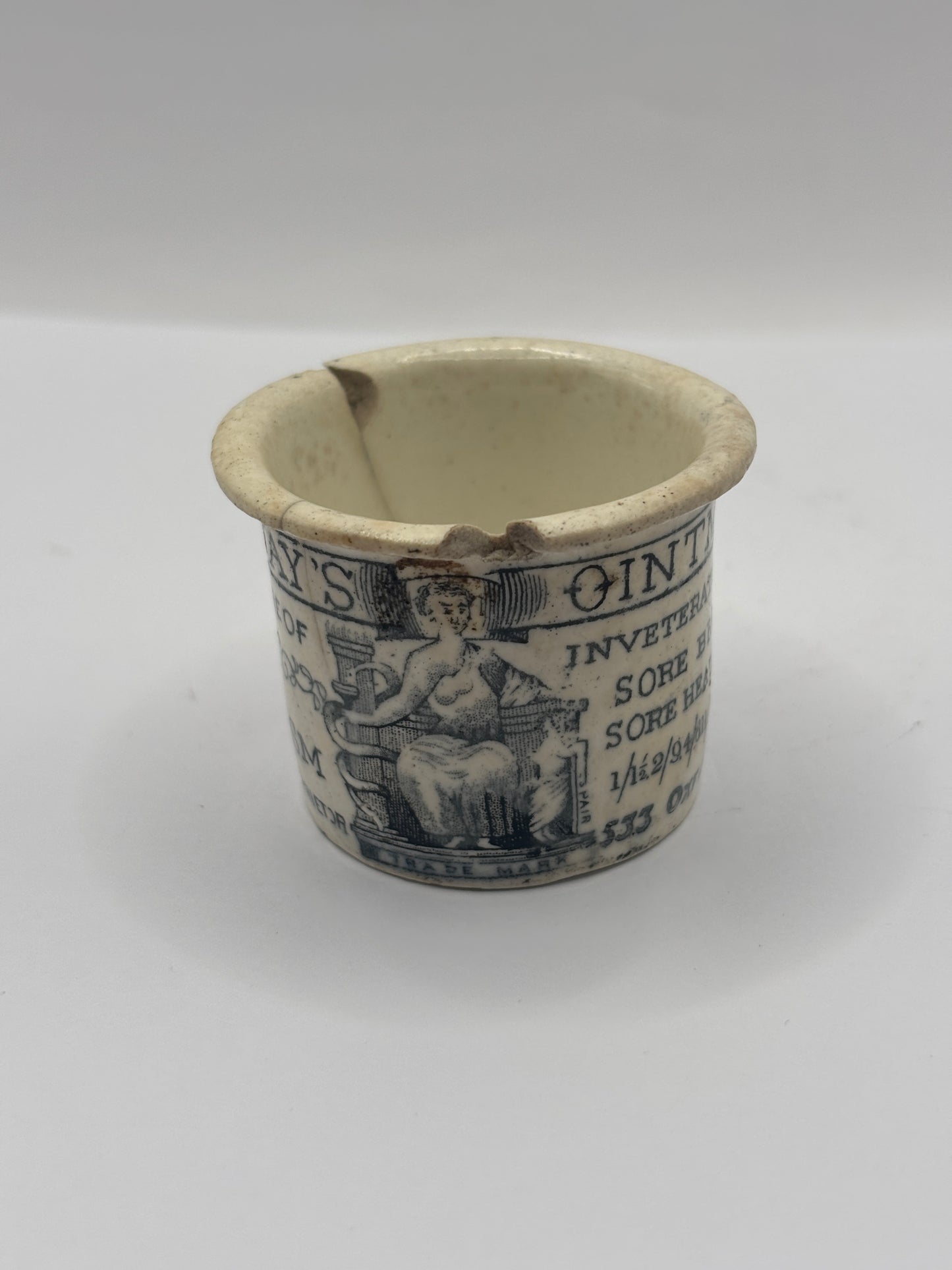 Old advertising ointment pot, Holloway’s ointment. Damaged