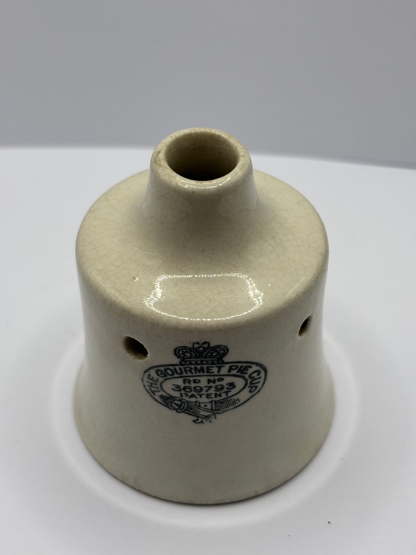 Old stoneware advertising gourmet pie cup