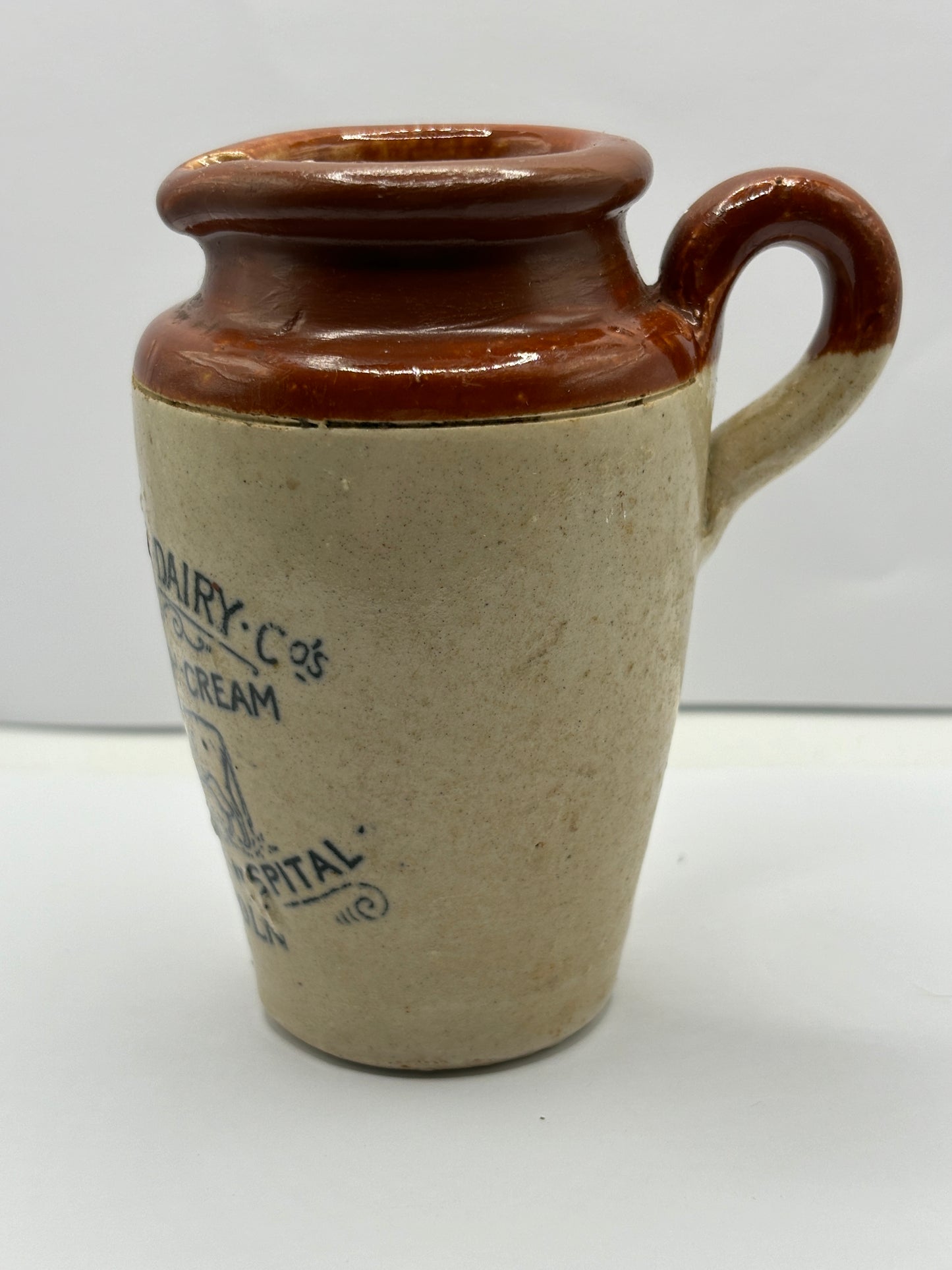 Excelsior dairy Co, Lincoln cream pot. Repaired