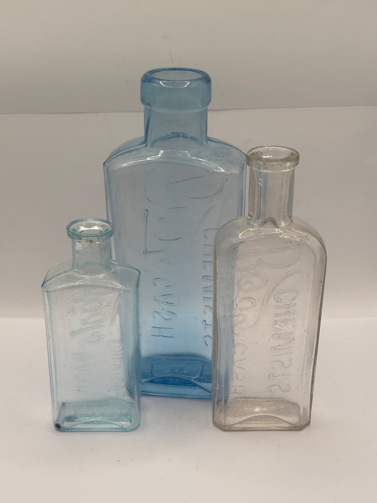 3 crusty old Boots cash chemist bottles