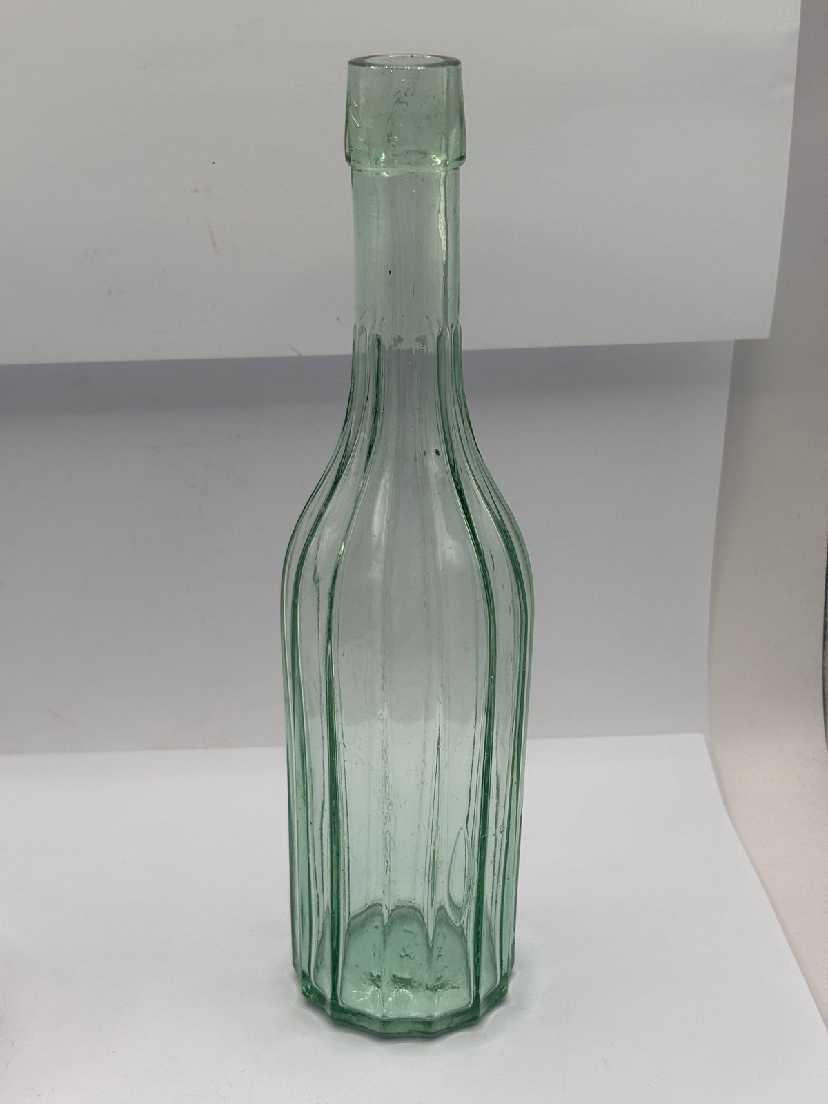 Old tall aqua glass bottle, vinegar?
