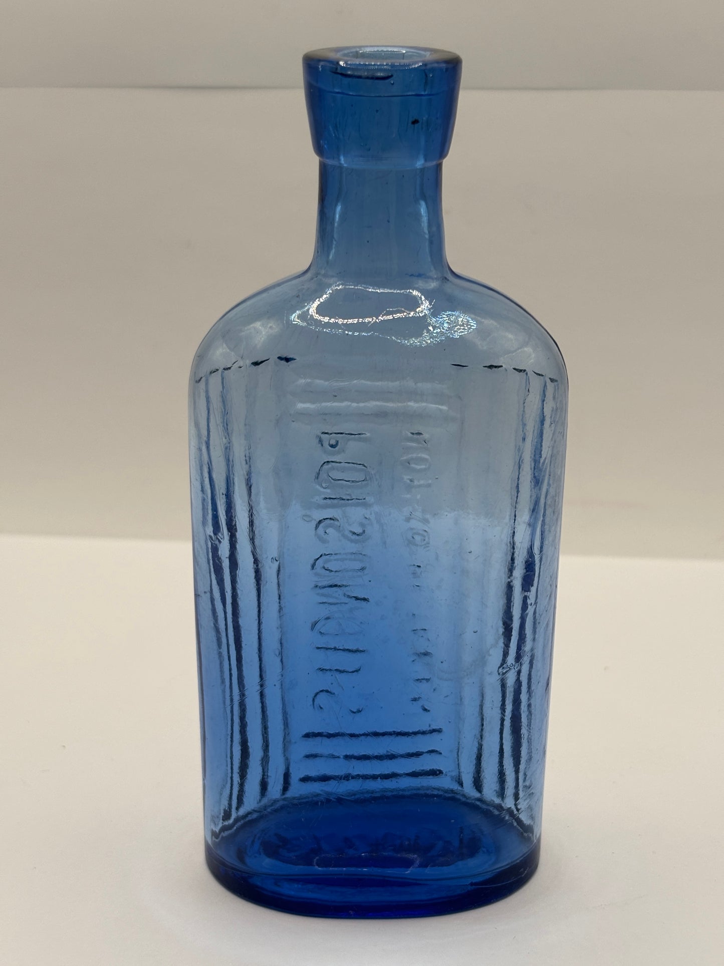 Old blue glass Poison bottle, Poisonous not to be taken