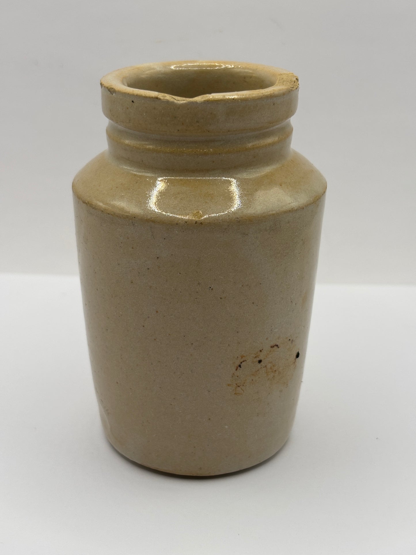 Old plain stoneware cream pot. Chipped