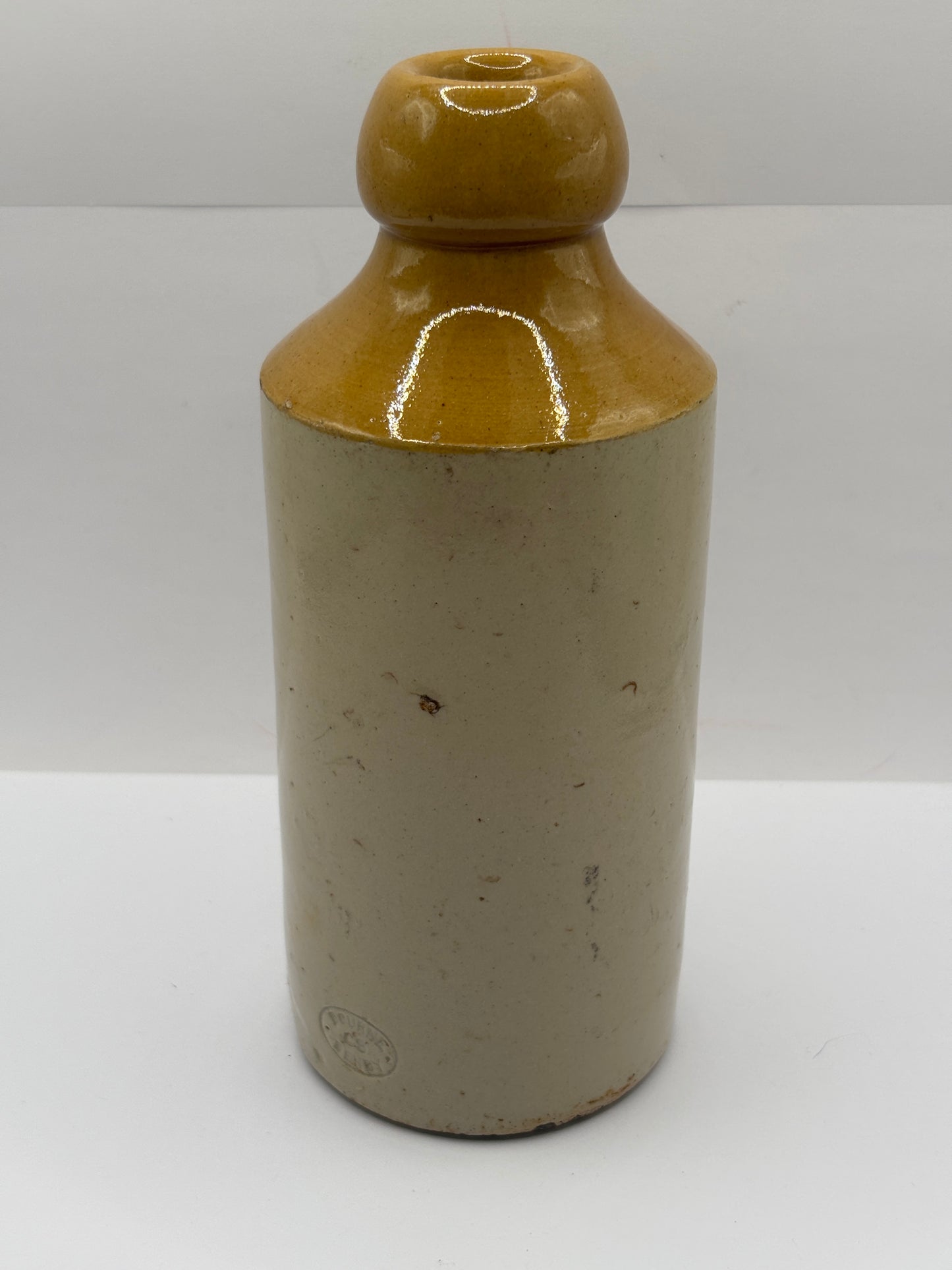 Old stoneware ginger beer bottle, Caley