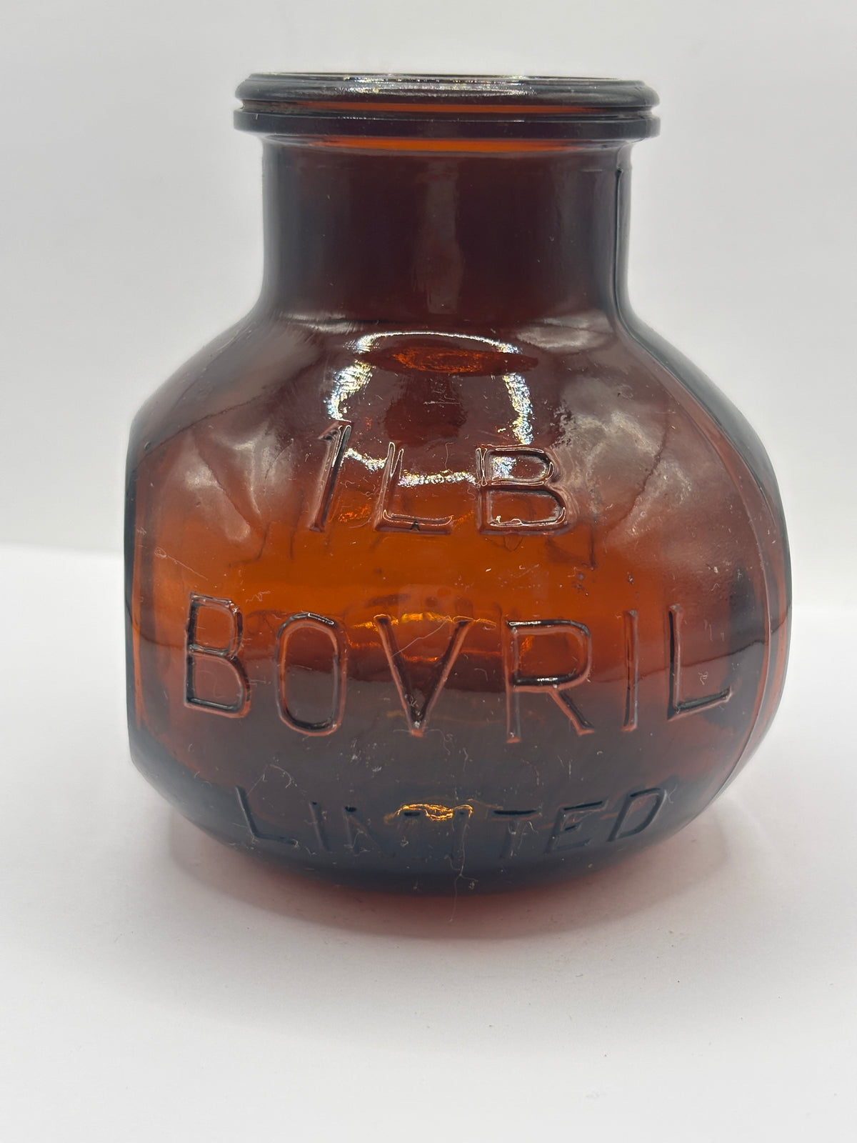 Old 1lb amber glass advertising Bovril bottle