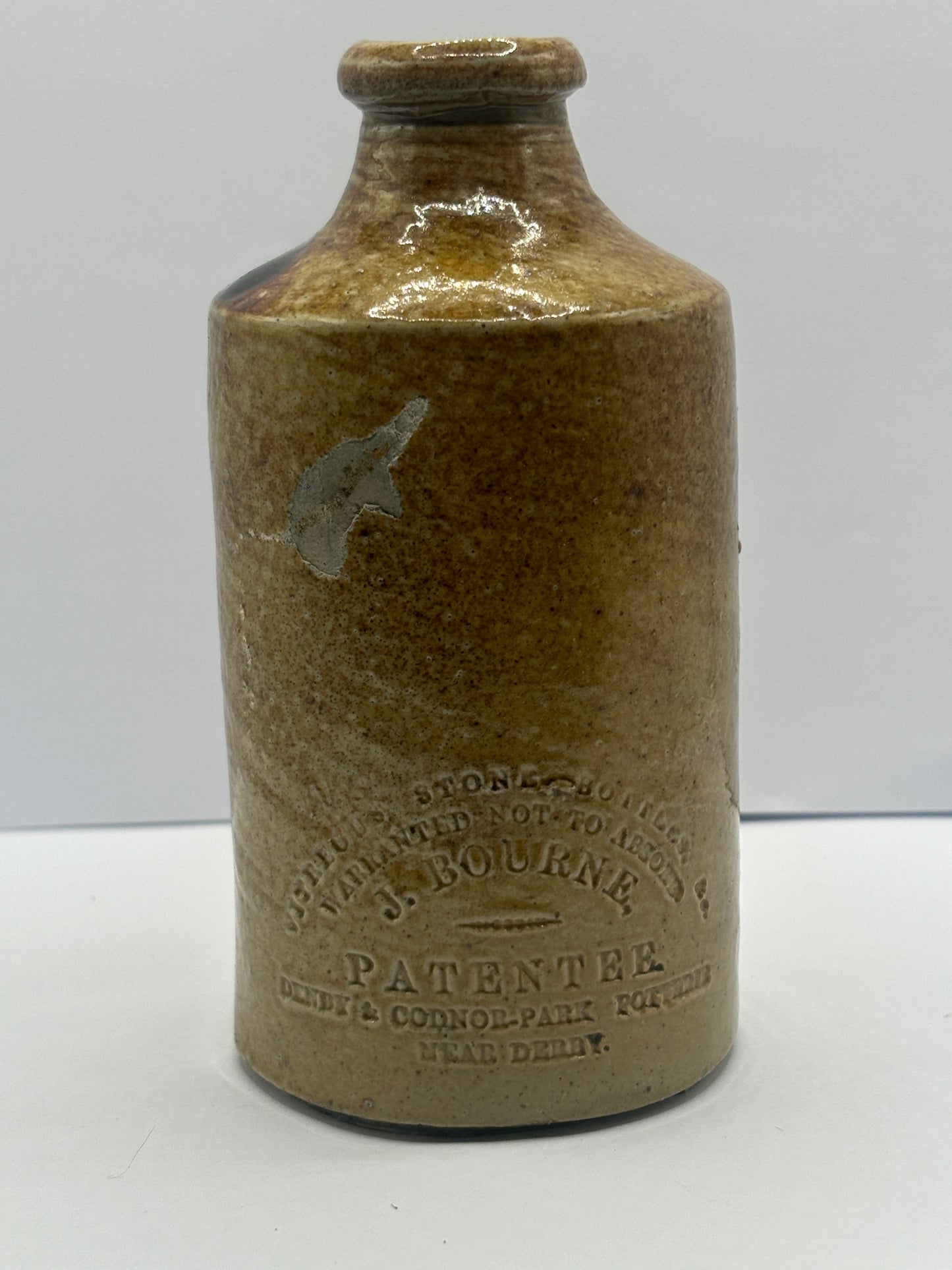 Stoneware advertising pot, Vitreous stoneware bottle, J Bourne