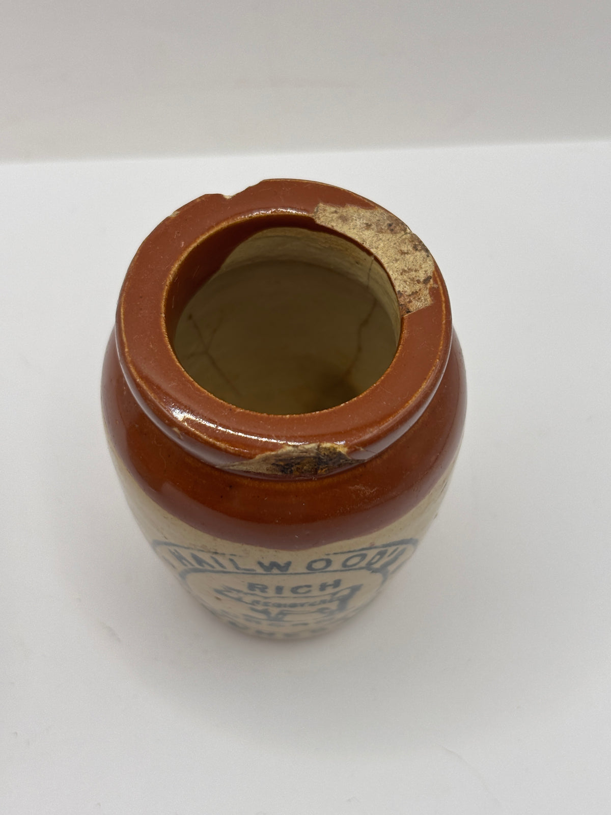 Old advertising cream pot, Hailwoods rich cream. Damaged