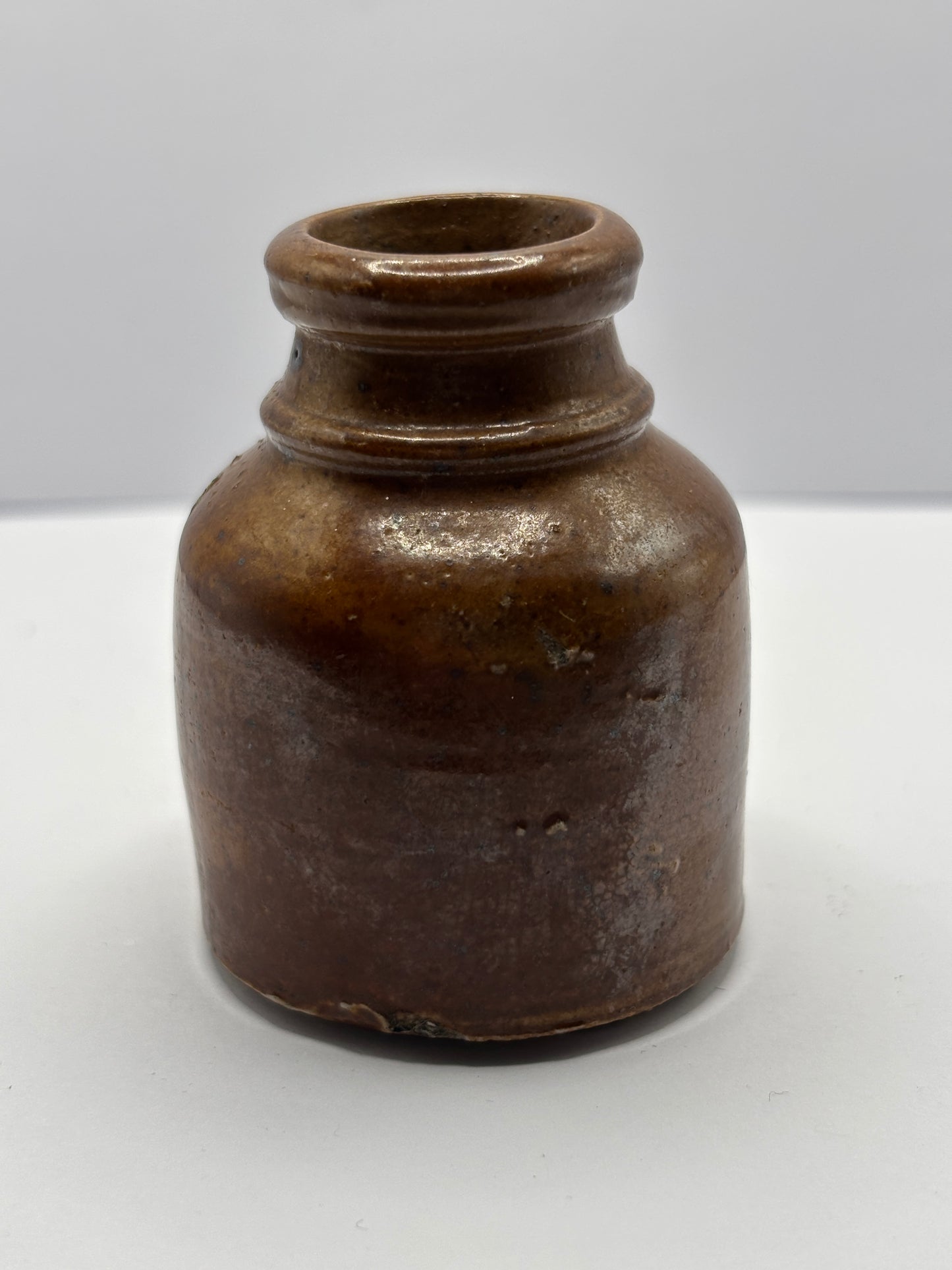 Old brown stoneware ink bottle, inkwell