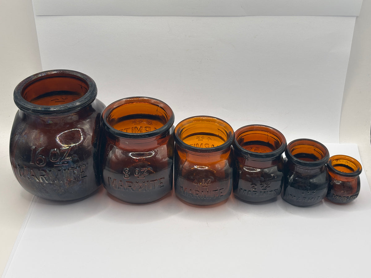 Full Set of 6 old amber glass Marmite bottles. 16oz- 0.5oz