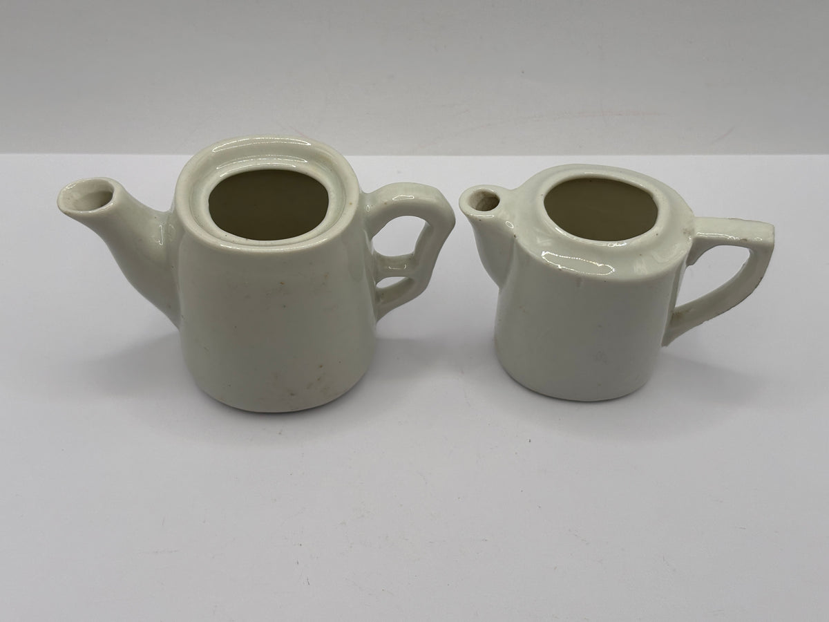2 old small dolls house tea pots (no lids)