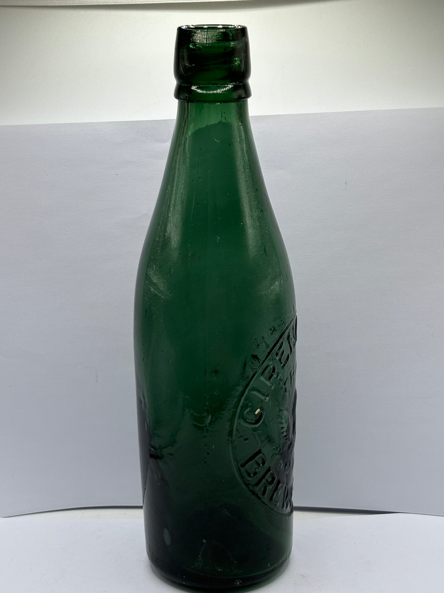 Old green glass beer bottle, Cirencester brewery